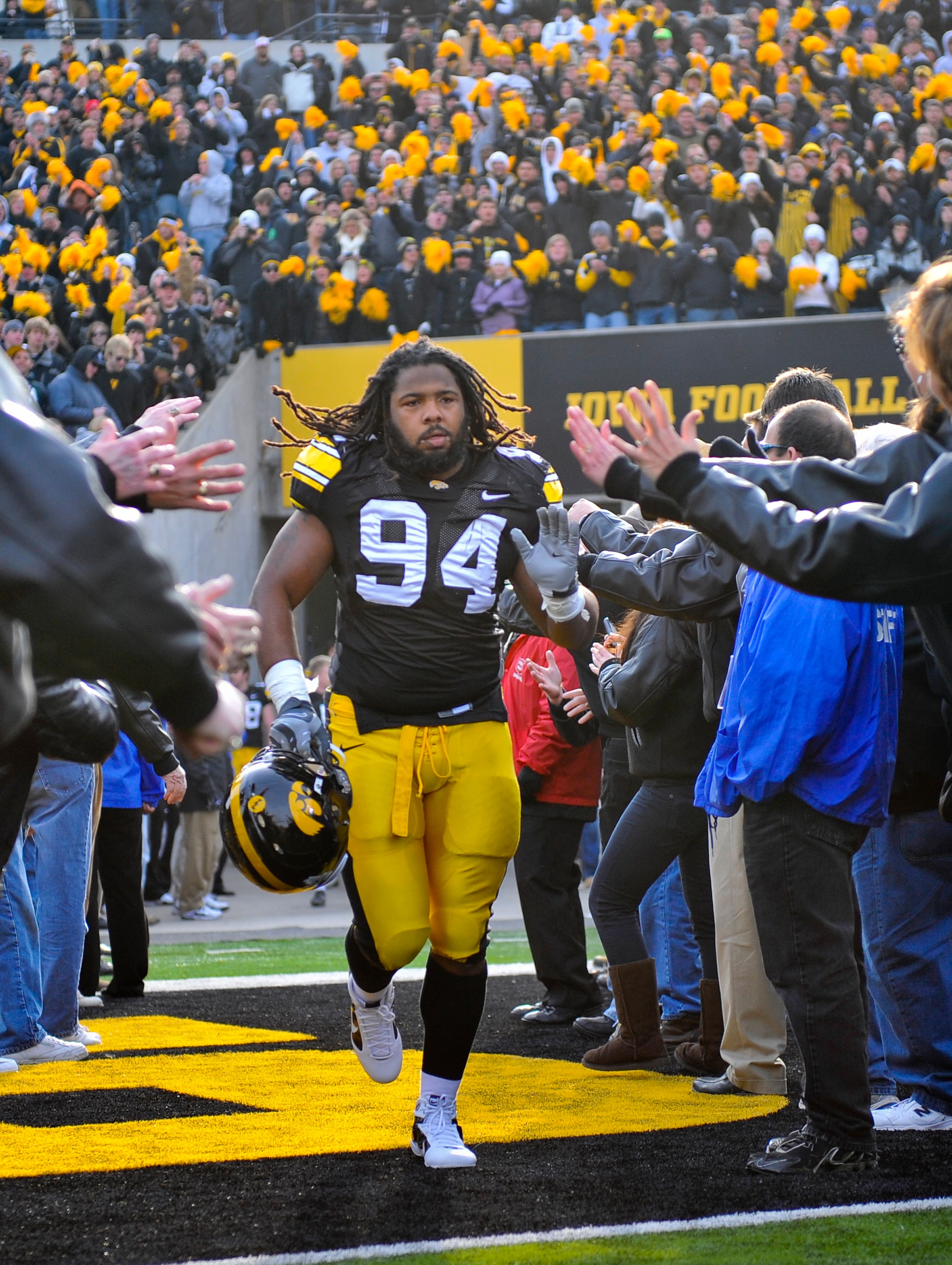 IOWA CITY, IA - NOVEMBER 20:  Defensive end Adrian Clayborn #94 of the University of Iowa Hawkeyes takes the field for the Ohio State Buckeyes NCAA college football game at Kinnick Stadium on November 20, 2010 in Iowa City, Iowa. Ohio State won 20-17 over