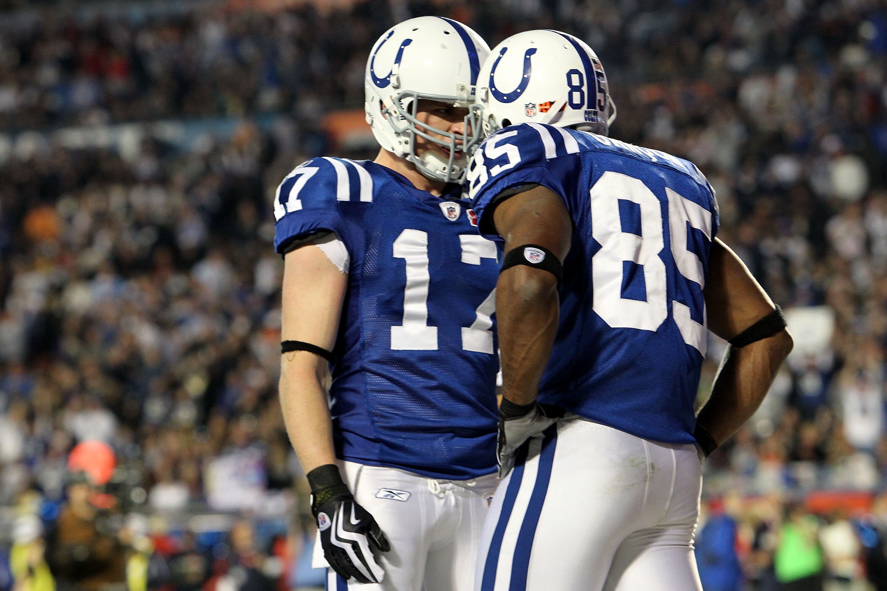MIAMI GARDENS, FL - FEBRUARY 07:  Pierre Garcon #85 of the Indianapolis Colts celebrates after scoring a touchdown with Austin Collie #17 against the New Orleans Saints during the first quarter Super Bowl XLIV on February 7, 2010 at Sun Life Stadium in Mi