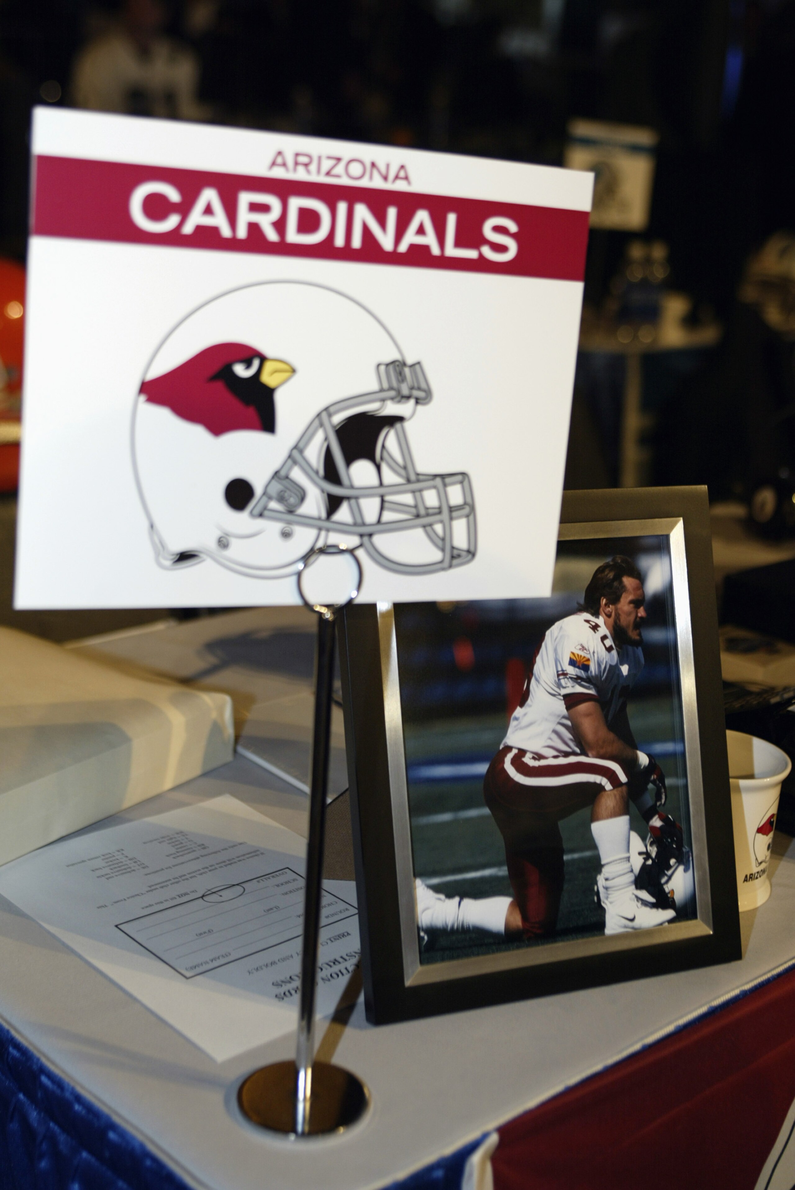 NEW YORK CITY - APRIL 24:  A memorial for former NFL defensive back Pat Tillman at the Arizona Cardinals draft table during the 2004 NFL Draft on April 24, 2004 at Madison Square Garden in New York City. The 27-year-old former football player was killed i