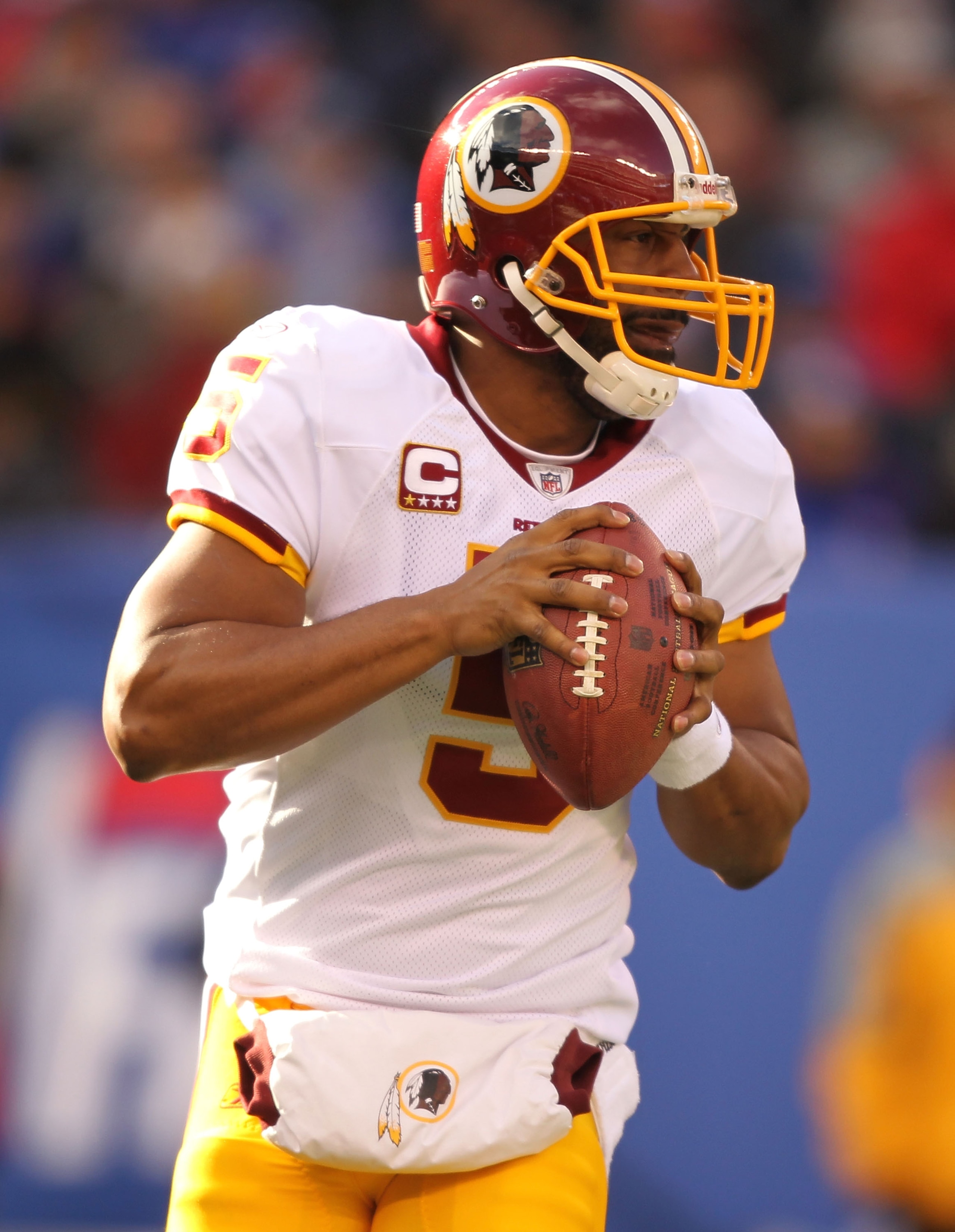 EAST RUTHERFORD, NJ - DECEMBER 05:  Donovan McNabb #5 of the Washington Redskins passes the  ball against the New York Giants during their game on December 5, 2010 at The New Meadowlands Stadium in East Rutherford, New Jersey.  (Photo by Al Bello/Getty Im