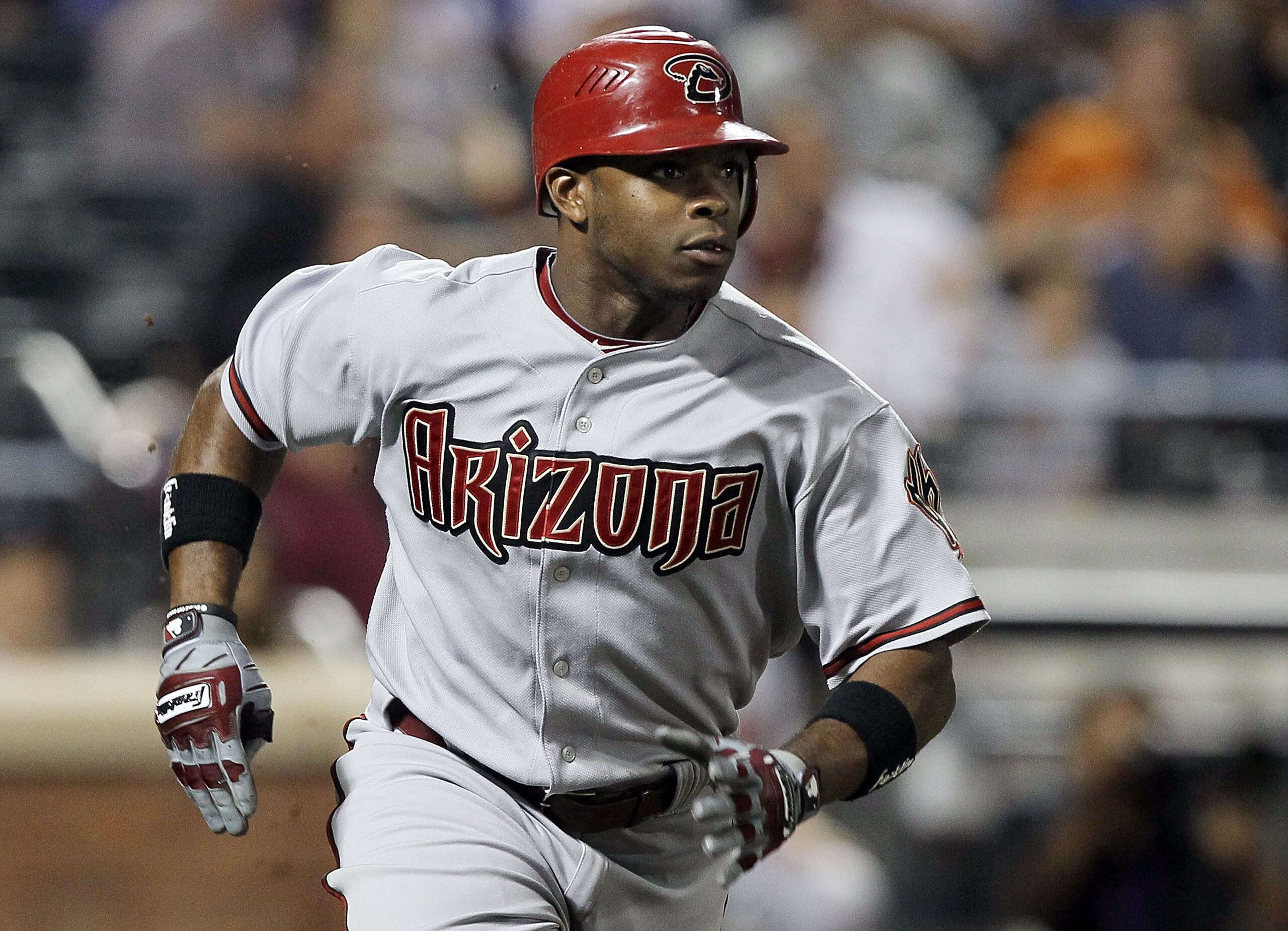 NEW YORK - JULY 31:  Justin Upton #10 of the Arizona Diamondbacks runs after hitting a seventh inning two run single against the New York Mets on July 31, 2010 at Citi Field in the Flushing neighborhood of the Queens borough of New York City.  (Photo by J