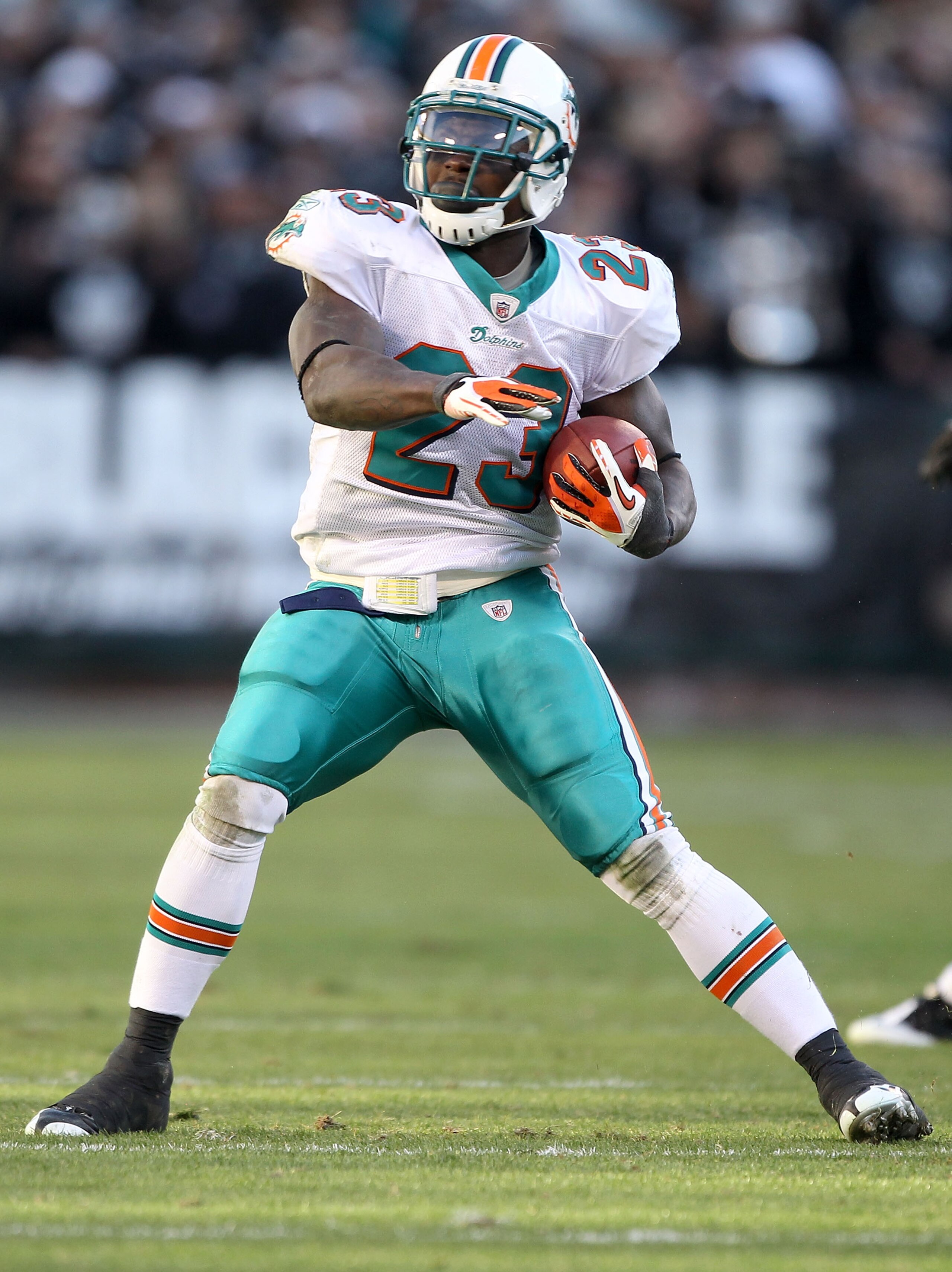 OAKLAND, CA - NOVEMBER 28:  Ronnie Brown #23 of the Miami Dolphins in action against the Oakland Raiders at Oakland-Alameda County Coliseum on November 28, 2010 in Oakland, California.  (Photo by Ezra Shaw/Getty Images)