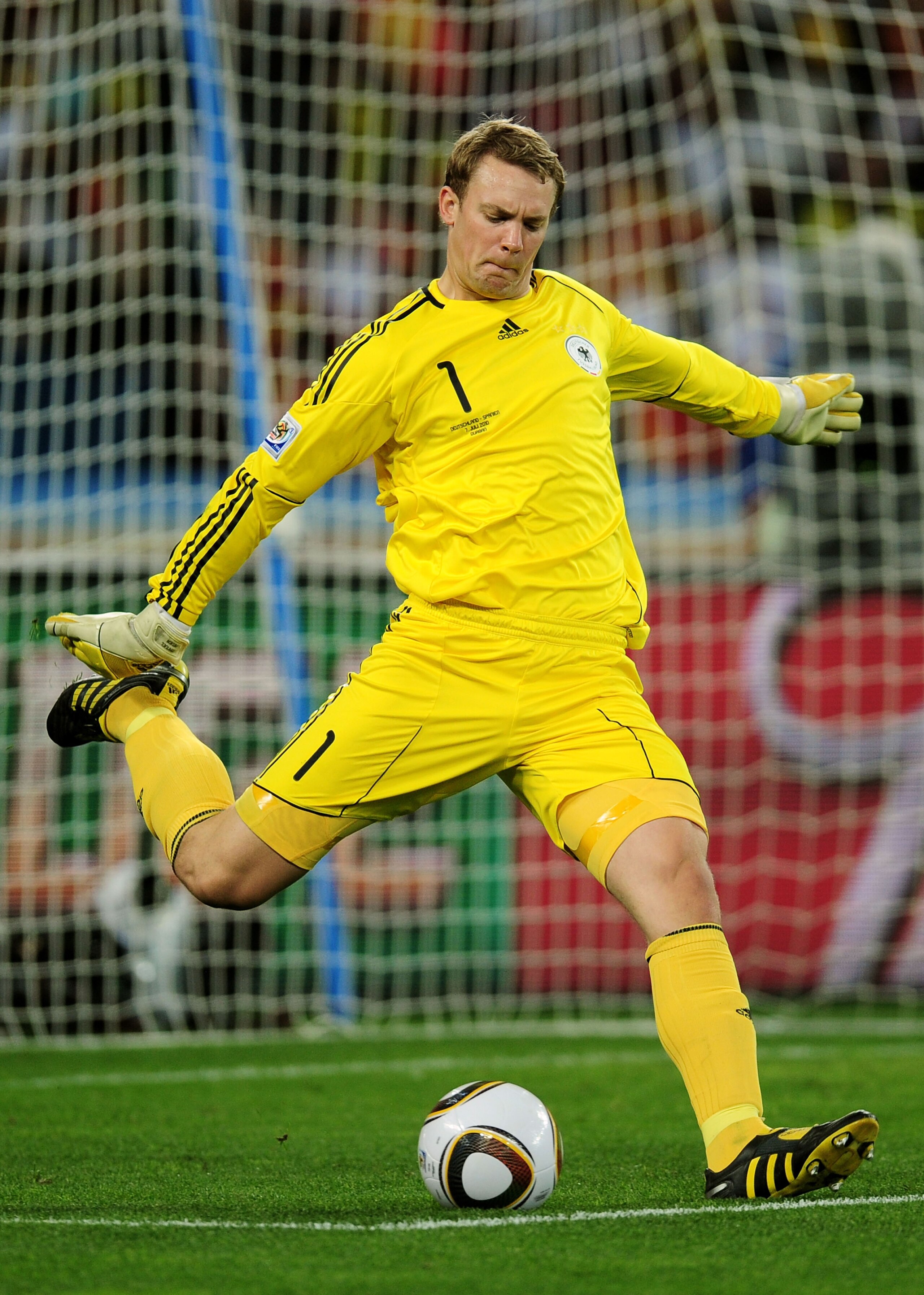 DURBAN, SOUTH AFRICA - JULY 07: Manuel Neuer of Germany takes a goal kick during the 2010 FIFA World Cup South Africa Semi Final match between Germany and Spain at Durban Stadium on July 7, 2010 in Durban, South Africa. (Photo by Clive Mason/Getty Image DURBAN, SOUTH AFRICA - JULY 07: Manuel Neuer of Germany takes a goal kick during the 2010 FIFA World Cup South Africa Semi Final match between Germany and Spain at Durban Stadium on July 7, 2010 in Durban, South Africa. (Photo by Clive Mason/Getty Image