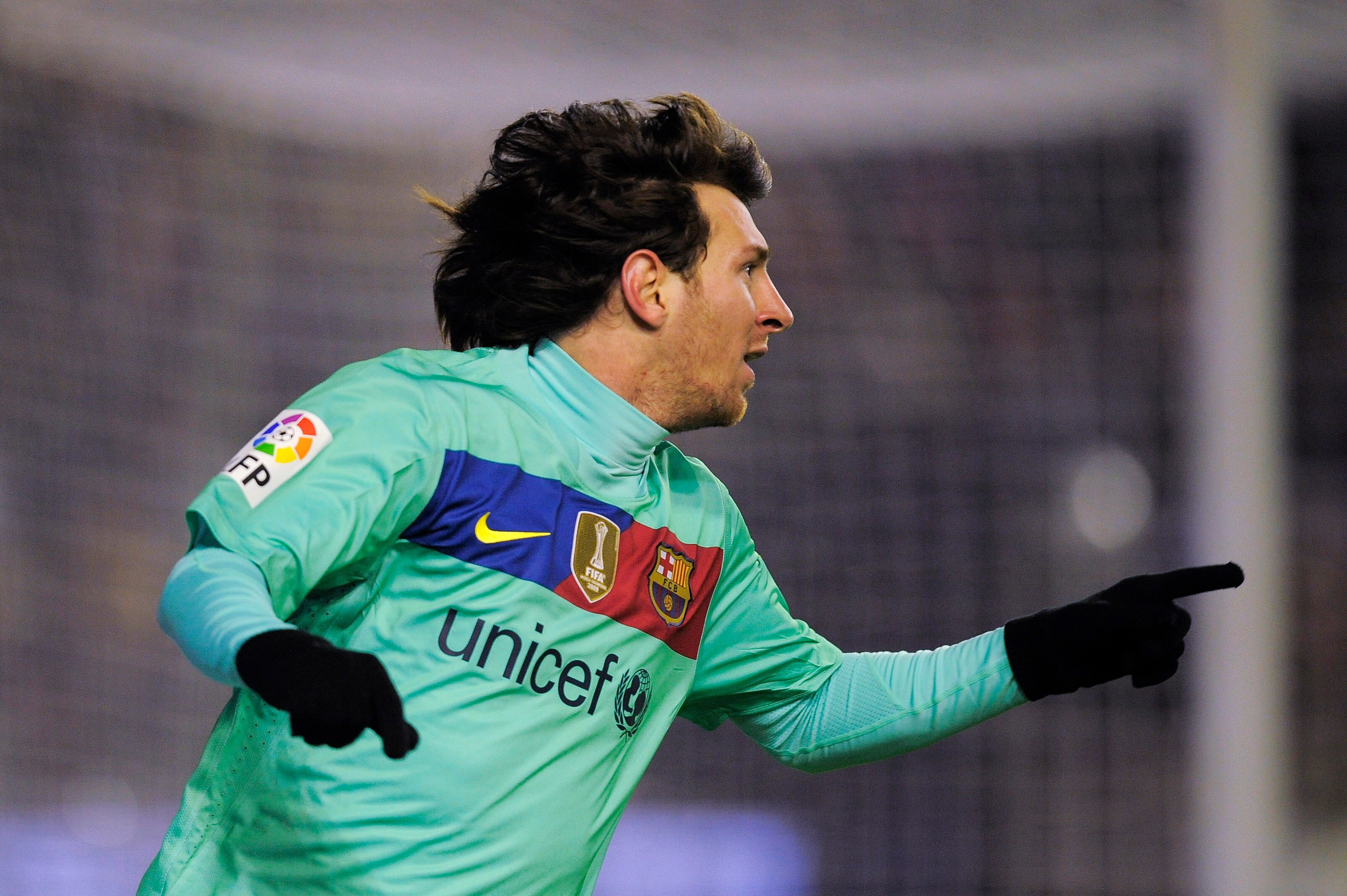 PAMPLONA, SPAIN - DECEMBER 04:  Lionel Messi of FC Barcelona celebrates after scoring the second goal during the la Liga match between CA Osasuna and Barcelona at Estadio Reyno de Navarra on December 4, 2010 in Pamplona, Spain.  (Photo by David Ramos/Gett