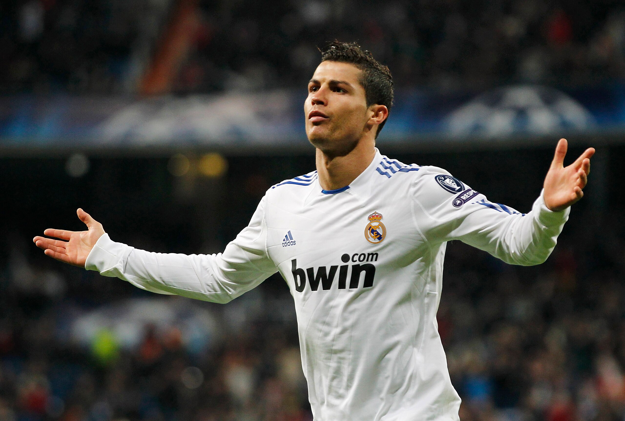 MADRID, SPAIN - DECEMBER 08: Cristiano Ronaldo of Real Madrid celebrates after scoring Real's second goal during the Champions League group G match between Real Madrid and AJ Auxerre at Estadio Santiago Bernabeu on December 8, 2010 in Madrid, Spain. (Ph MADRID, SPAIN - DECEMBER 08: Cristiano Ronaldo of Real Madrid celebrates after scoring Real's second goal during the Champions League group G match between Real Madrid and AJ Auxerre at Estadio Santiago Bernabeu on December 8, 2010 in Madrid, Spain. (Ph