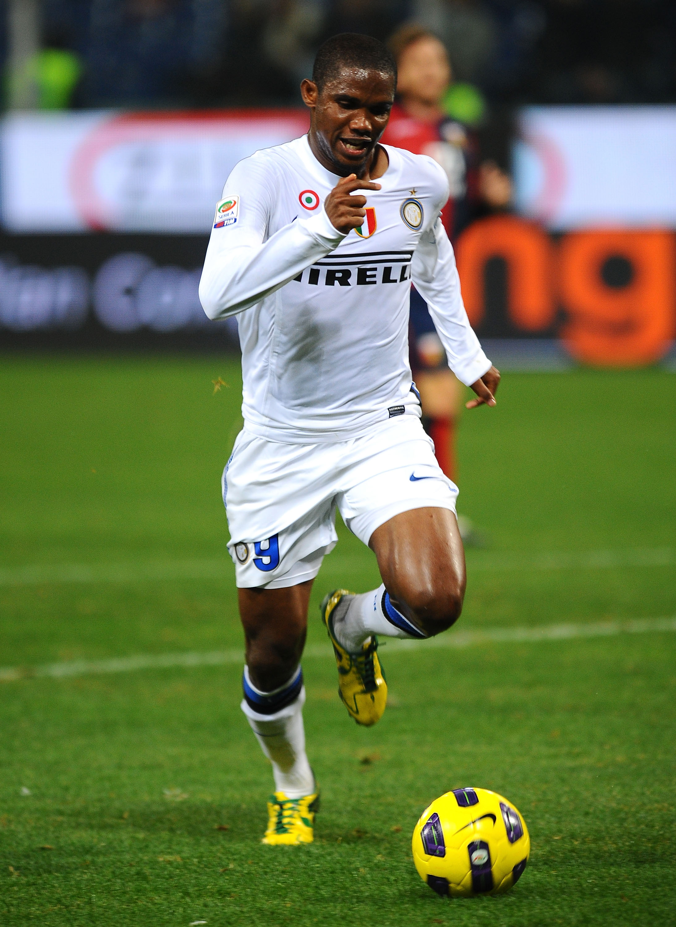 GENOA, ITALY - OCTOBER 29: Samuel Eto'o Fils of FC Internazionale Milano runs with the ball during the Serie A match between Genoa CFC and FC Inter Milan at Stadio Luigi Ferraris on October 29, 2010 in Genoa, Italy. (Photo by Massimo Cebrelli/Getty Images