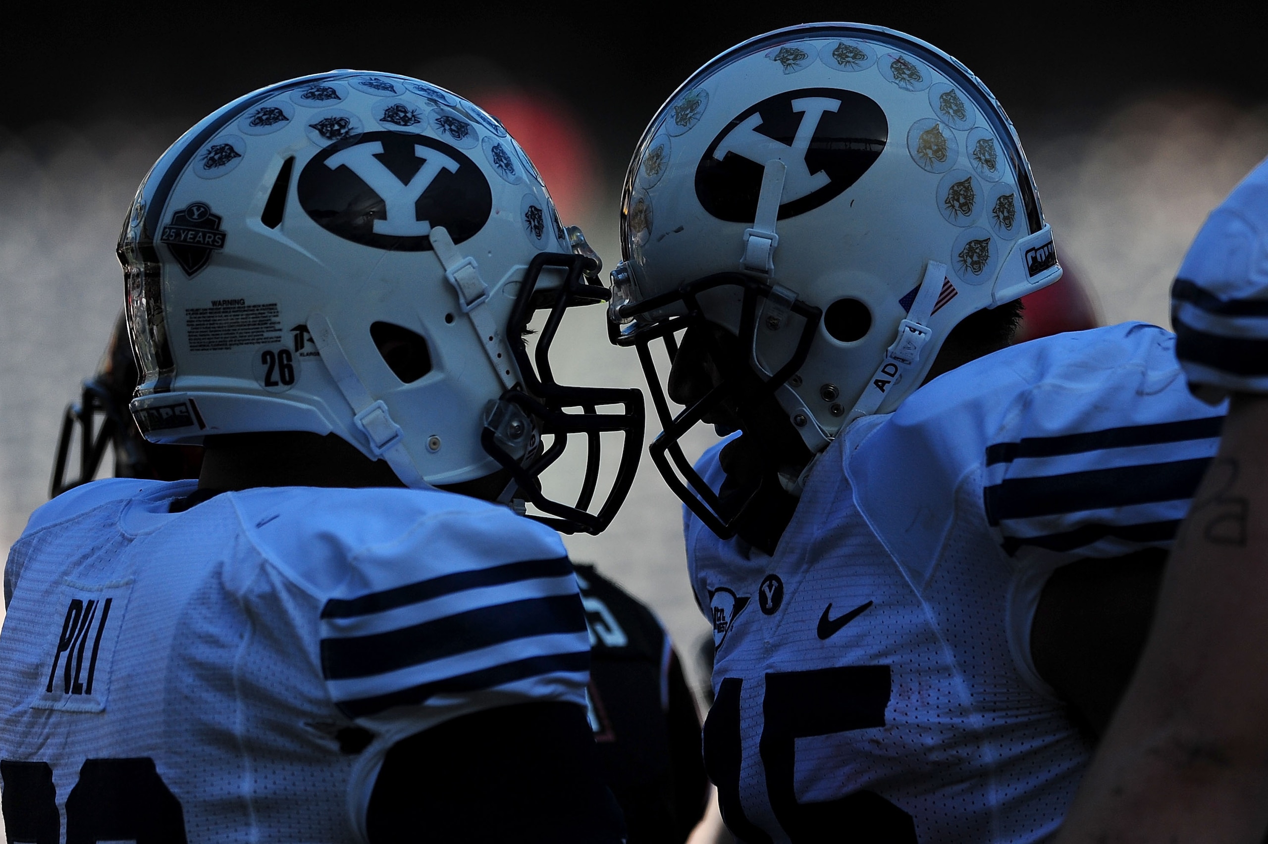 SAN DIEGO - OCTOBER 17:  Max Hall #15 and Jo Jo Pili #26 of BYU Cougars celebrate a touchdown against San Diego State Aztecs at Qualcomm Stadium on October 17, 2009 in San Diego, California.  (Photo by Jacob de Golish/Getty Images)
