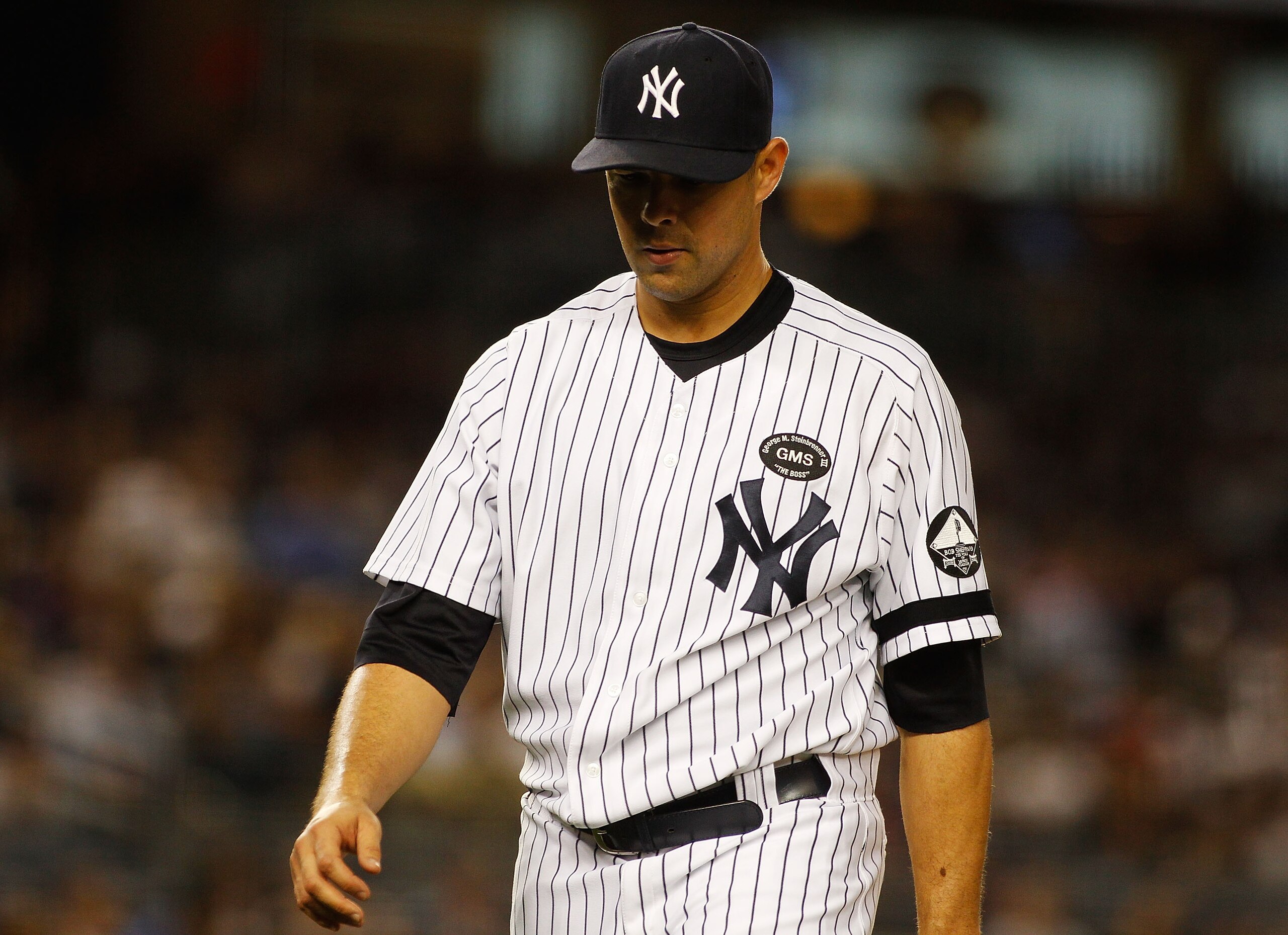 NEW YORK - SEPTEMBER 23: Javier Vazquez #31 of the New York Yankees walks off the mound after giving up two runs in the seventh-inning against the Tampa Bay Rays on September 23, 2010 at Yankee Stadium in the Bronx borough of New York City. (Photo by Mi NEW YORK - SEPTEMBER 23: Javier Vazquez #31 of the New York Yankees walks off the mound after giving up two runs in the seventh-inning against the Tampa Bay Rays on September 23, 2010 at Yankee Stadium in the Bronx borough of New York City. (Photo by Mi