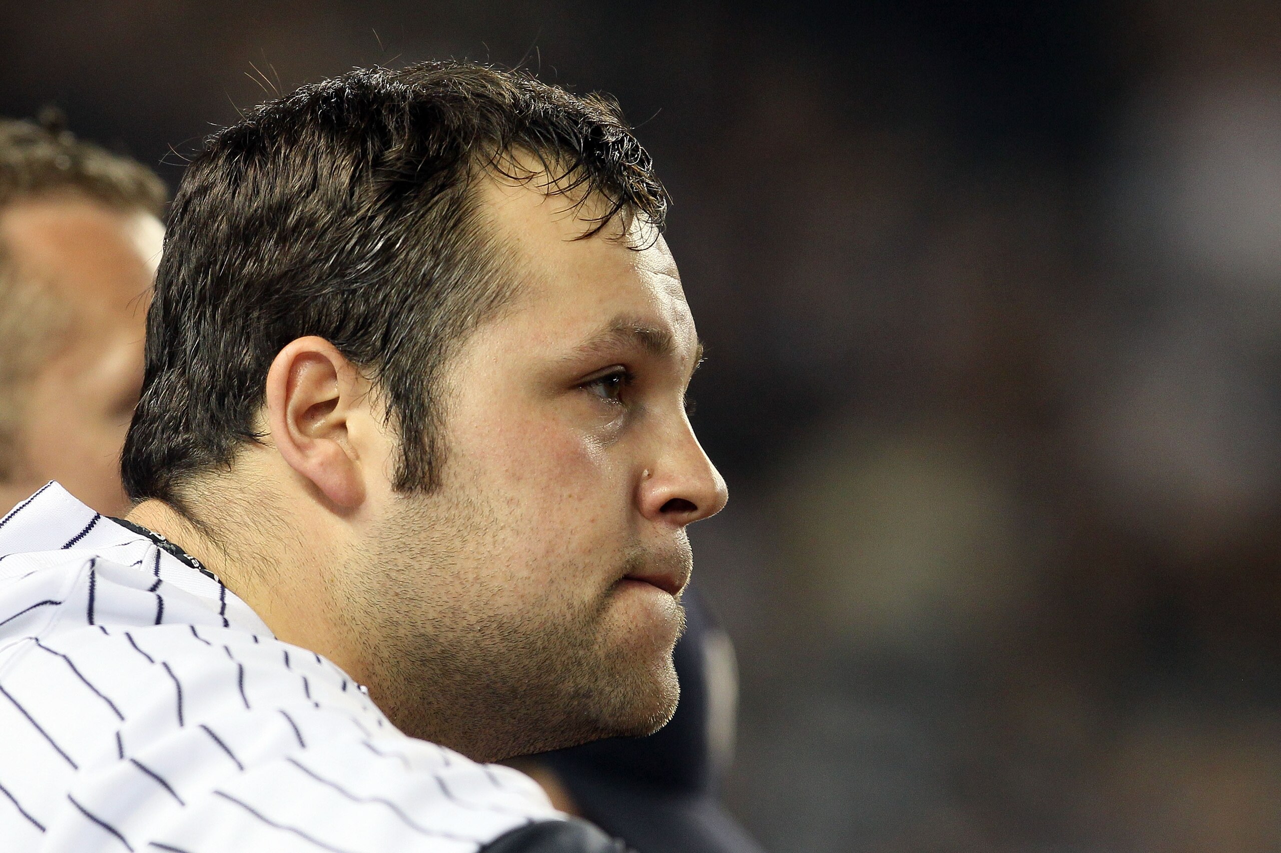 NEW YORK - OCTOBER 19:  Joba Chamberlain #62 of the New York Yankees looks on against the Texas Rangers in Game Four of the ALCS during the 2010 MLB Playoffs at Yankee Stadium on October 19, 2010 in the Bronx borough of New York City.  (Photo by Jim McIsa