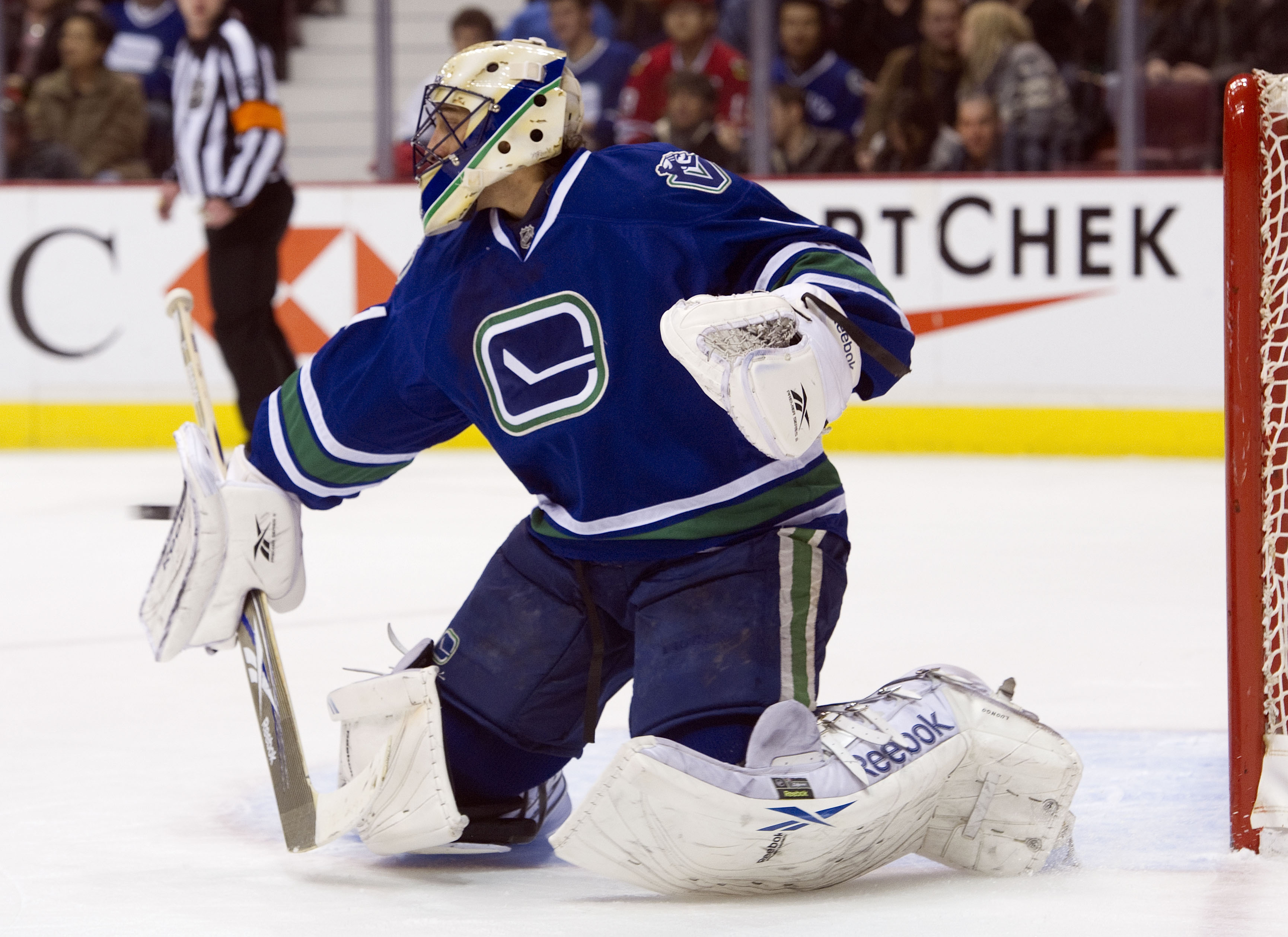 VANCOUVER, CANADA - NOVEMBER 20: Goalie Roberto Luongo #1 of the Vancouver Canucks makes a blocker save against the Chicago Blackhawks during the first period in NHL action on November 20, 2010 at Rogers Arena in Vancouver, British Columbia, Canada.  (Pho