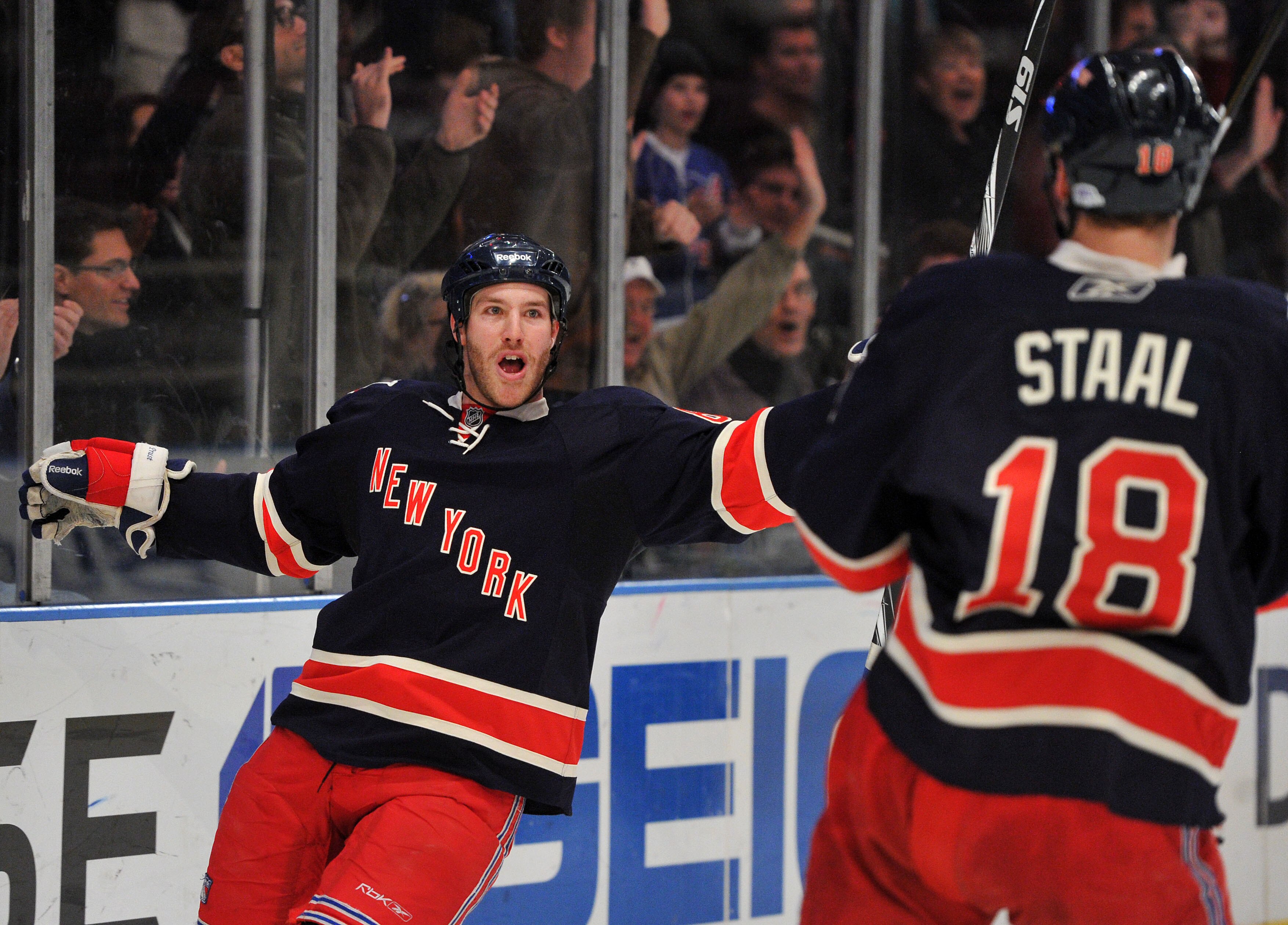 NEW YORK, NY - DECEMBER 5: Brandon Prust #8 of the New York Rangers celebrates scoring a second period goal with Marc Staal #18 of the New York Rangers during the second period against the Ottawa Senators at Madison Square Garden on December 5, 2010 in Ne