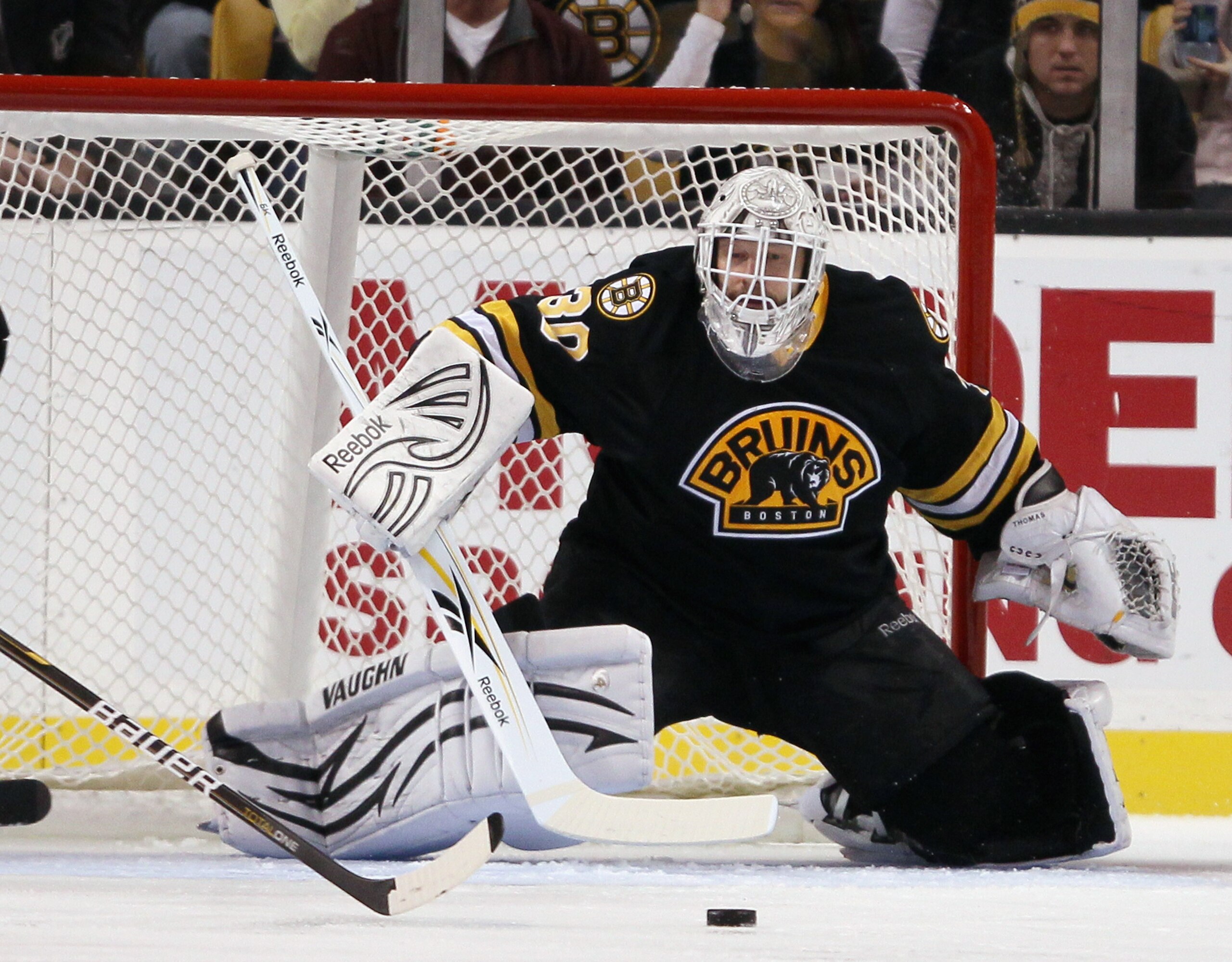 BOSTON - NOVEMBER 26: Tim Thomas #30 of the Boston Bruins stops a shot in the first period against the Carolina Hurricanes on November 26, 2010 at the TD Garden in Boston, Massachusetts. (Photo by Elsa/Getty Images) BOSTON - NOVEMBER 26: Tim Thomas #30 of the Boston Bruins stops a shot in the first period against the Carolina Hurricanes on November 26, 2010 at the TD Garden in Boston, Massachusetts. (Photo by Elsa/Getty Images)