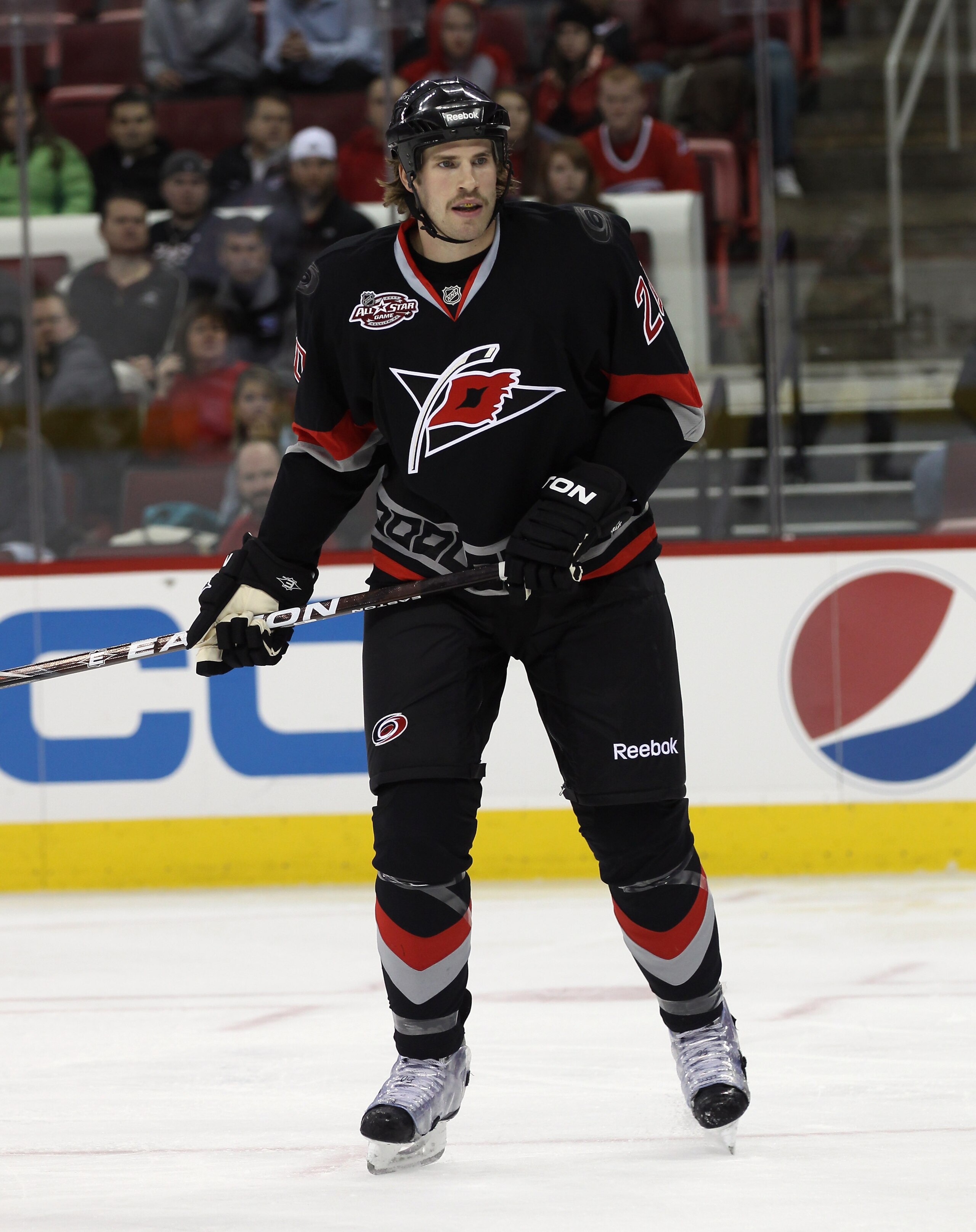 RALEIGH, NC - NOVEMBER 29: Troy Bodie #20 of the Carolina Hurricanes skates against the Dallas Stars at the RBC Center on November 29, 2010 in Raleigh, North Carolina. The Stars defeated the Hurricanes 4-1. (Photo by Bruce Bennett/Getty Images) RALEIGH, NC - NOVEMBER 29: Troy Bodie #20 of the Carolina Hurricanes skates against the Dallas Stars at the RBC Center on November 29, 2010 in Raleigh, North Carolina. The Stars defeated the Hurricanes 4-1. (Photo by Bruce Bennett/Getty Images)