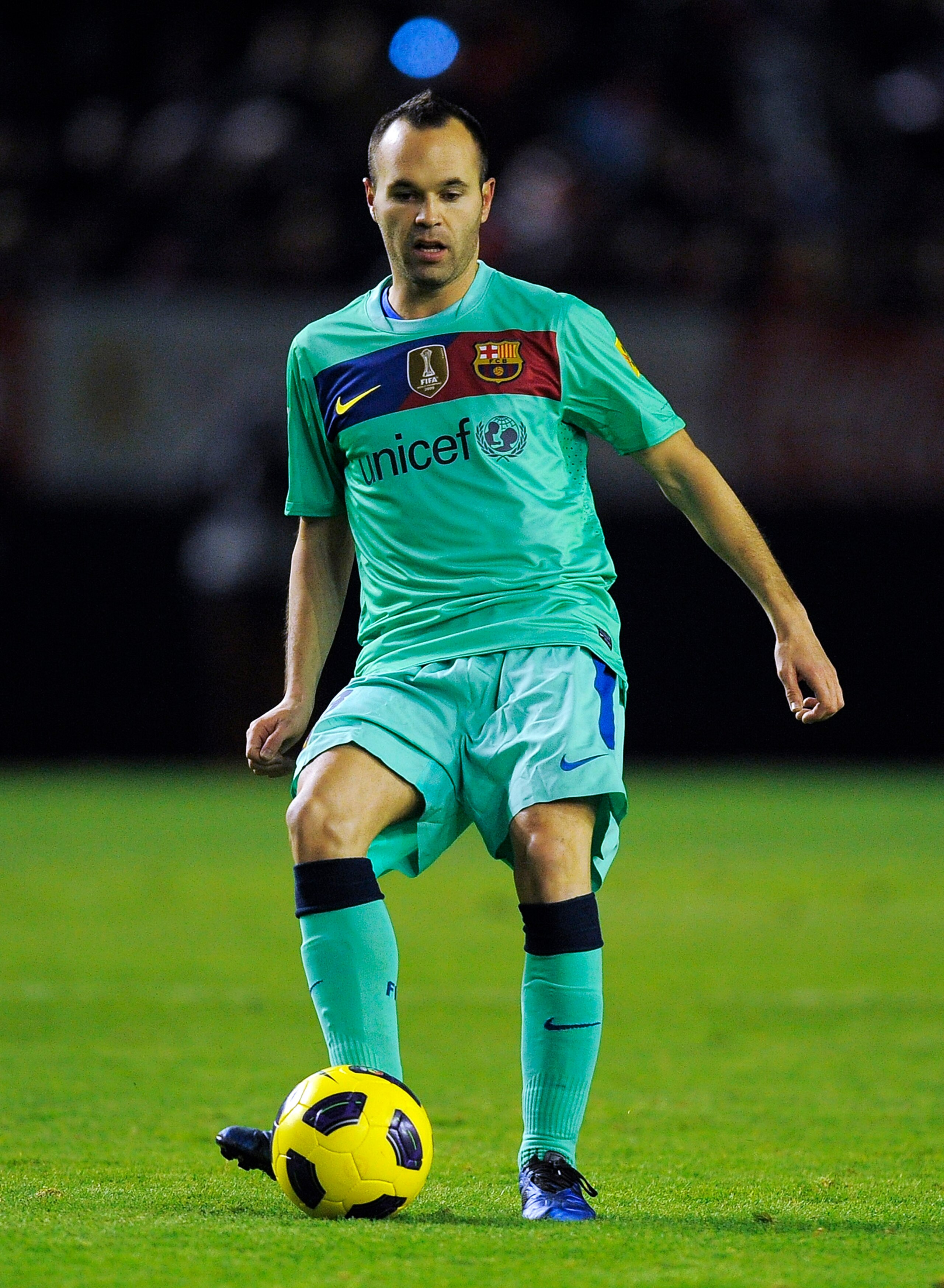 PAMPLONA, SPAIN - DECEMBER 04:  Andres Iniesta of FC Barcelona goes for the ball during the La Liga match between CA Osasuna and Barcelona at Estadio Reyno de Navarra on December 4, 2010 in Pamplona, Spain. Barcelona won 0-3.  (Photo by David Ramos/Getty