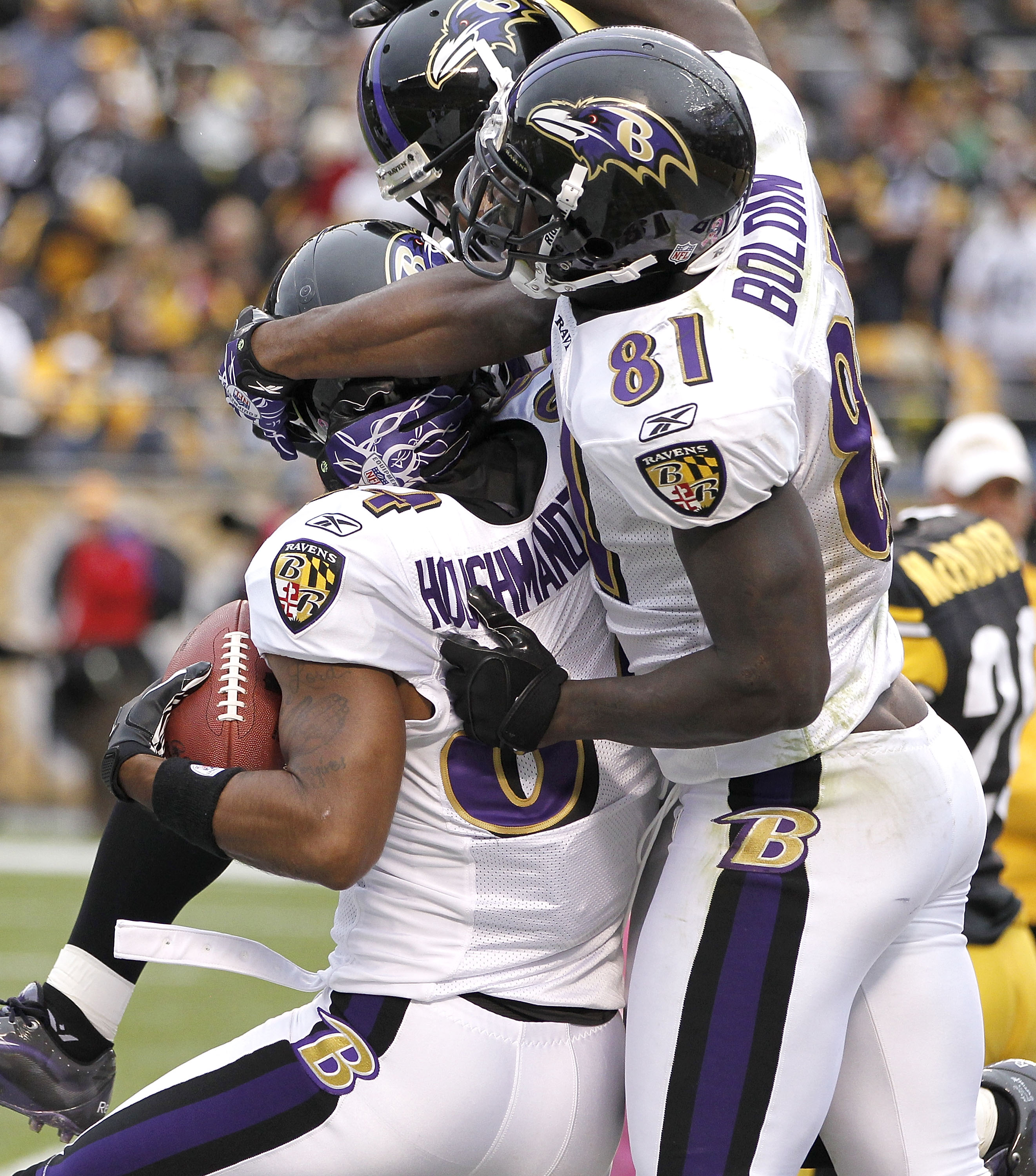 PITTSBURGH - OCTOBER 03:  T.J. Houshmandzadeh #84 of the Baltimore Ravens celebrates his game winning touchdown with Anquan Boldin #81 while playing the Pittsburgh Steelers on October 3, 2010 at Heinz Field in Pittsburgh, Pennsylvania.  (Photo by Gregory