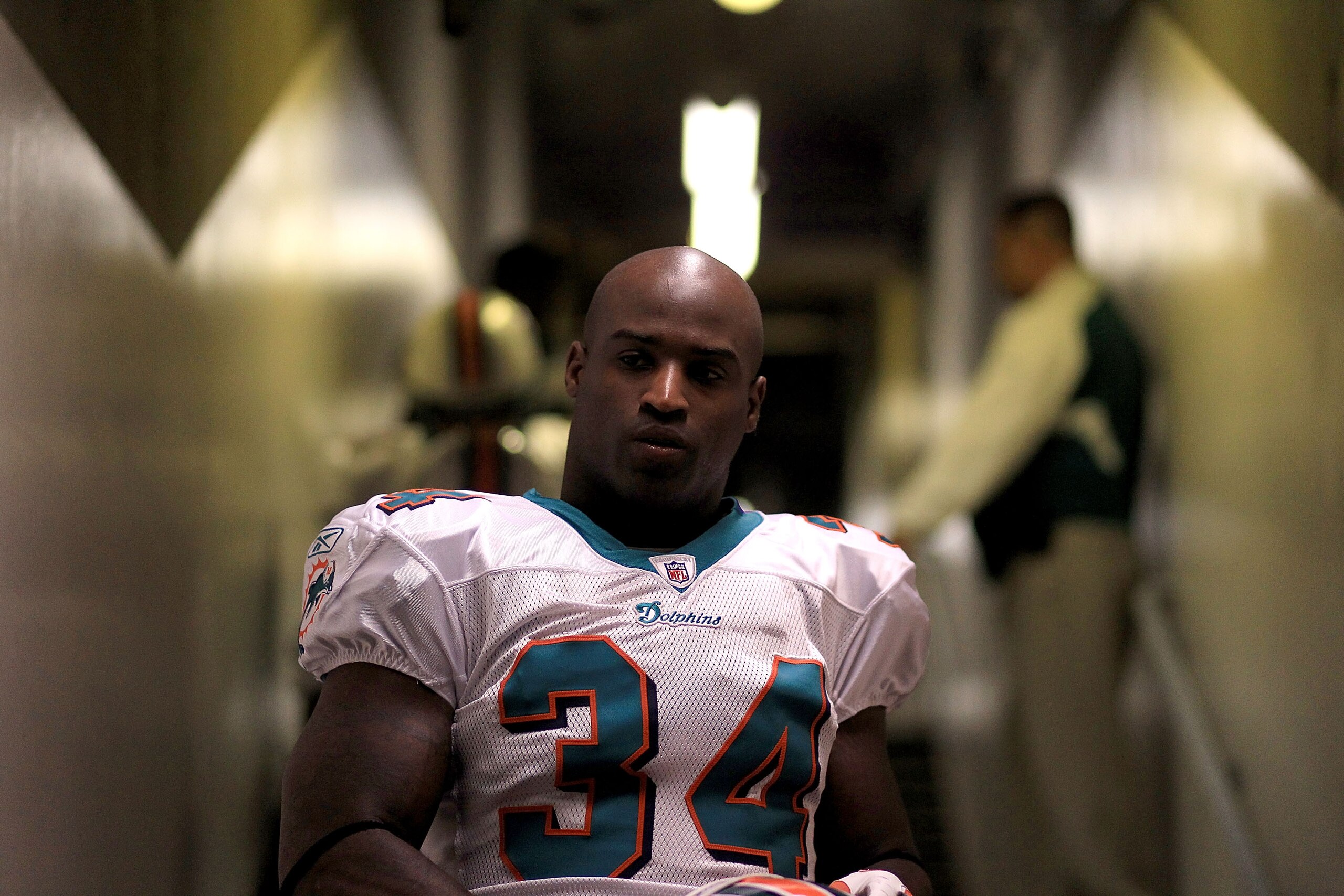 OAKLAND, CA - NOVEMBER 28:  Ricky Williams #34 of the Miami Dolphins walks down the tunnel for their game against the Oakland Raiders at Oakland-Alameda County Coliseum on November 28, 2010 in Oakland, California.  (Photo by Ezra Shaw/Getty Images)