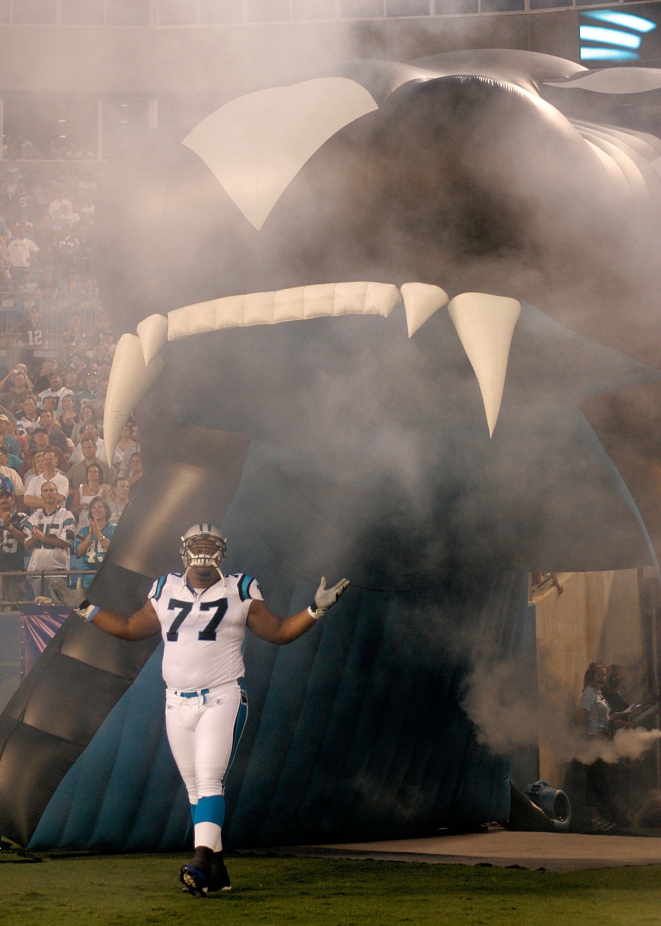 CHARLOTTE, NC - AUGUST 24:  Kris Jenkins #77 of the Carolina Panthers is introduced before a preseason NFL game against the New England Patriots at Bank of America Stadium August 24, 2007 in Charlotte, North Carolina. (Photo by Grant Halverson/Getty Image