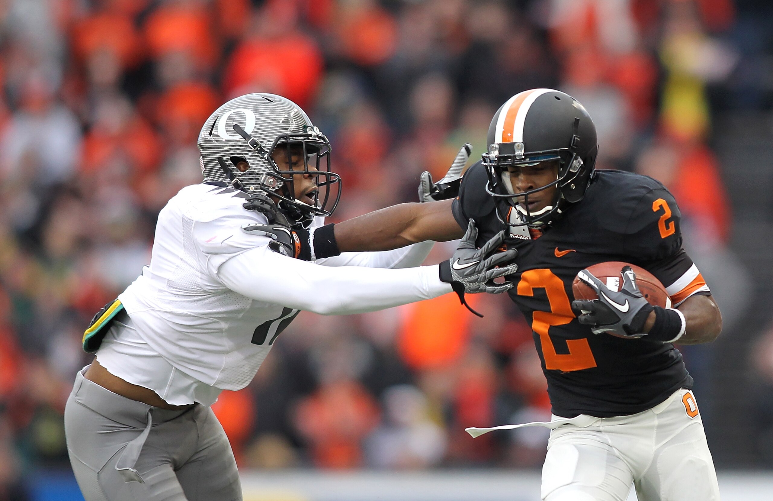 CORVALLIS, OR - DECEMBER 04:  Markus Wheaton #2 of the Oregon State Beavers runs against Eddie Pleasant #11 of the Oregon Ducks during the 114th Civil War on December 4, 2010 at the Reser Stadium in Corvallis, Oregon.  (Photo by Jonathan Ferrey/Getty Imag