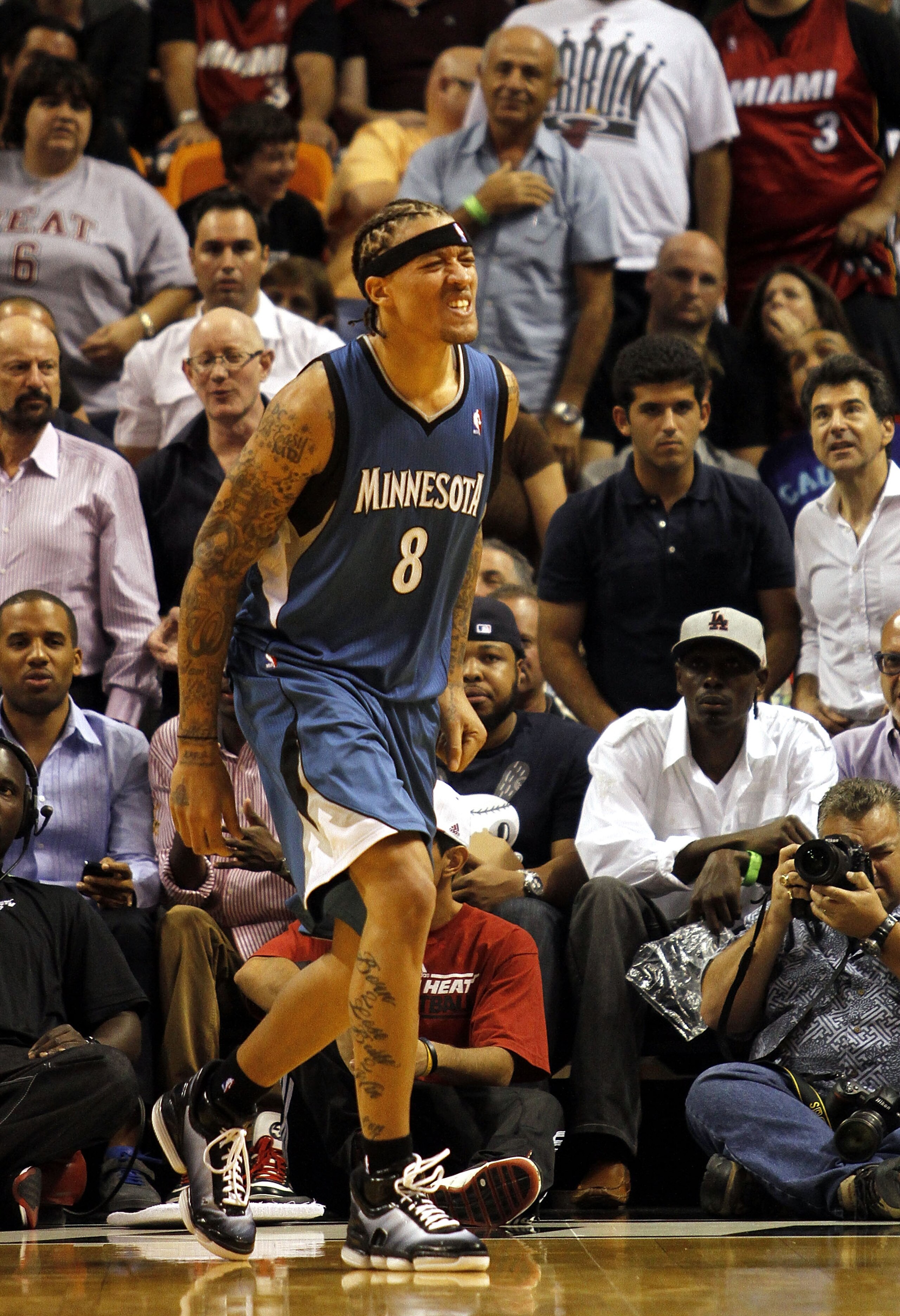 MIAMI - NOVEMBER 02:  Forward Michael Beasley #8 of the Minnesota Wolves walks off the court injured against the Miami Heat at American Airlines Arena on November 2, 2010 in Miami, Florida. NOTE TO USER: User expressly acknowledges and agrees that, by dow