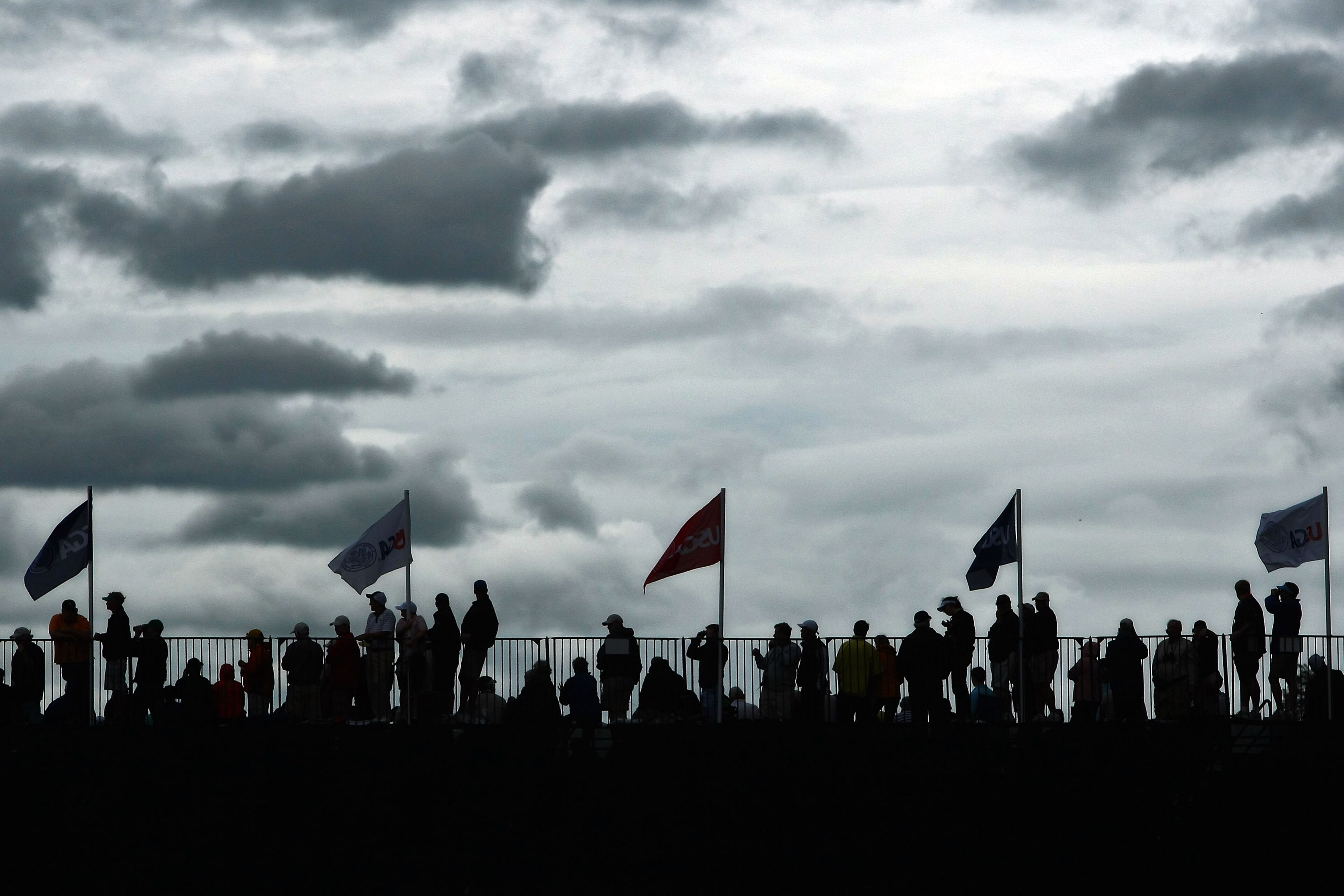 FARMINGDALE, NY - JUNE 22:  Golf fans watch play during the continuation of the final round of the 109th U.S. Open on the Black Course at Bethpage State Park on June 22, 2009 in Farmingdale, New York.  (Photo by Chris McGrath/Getty Images)