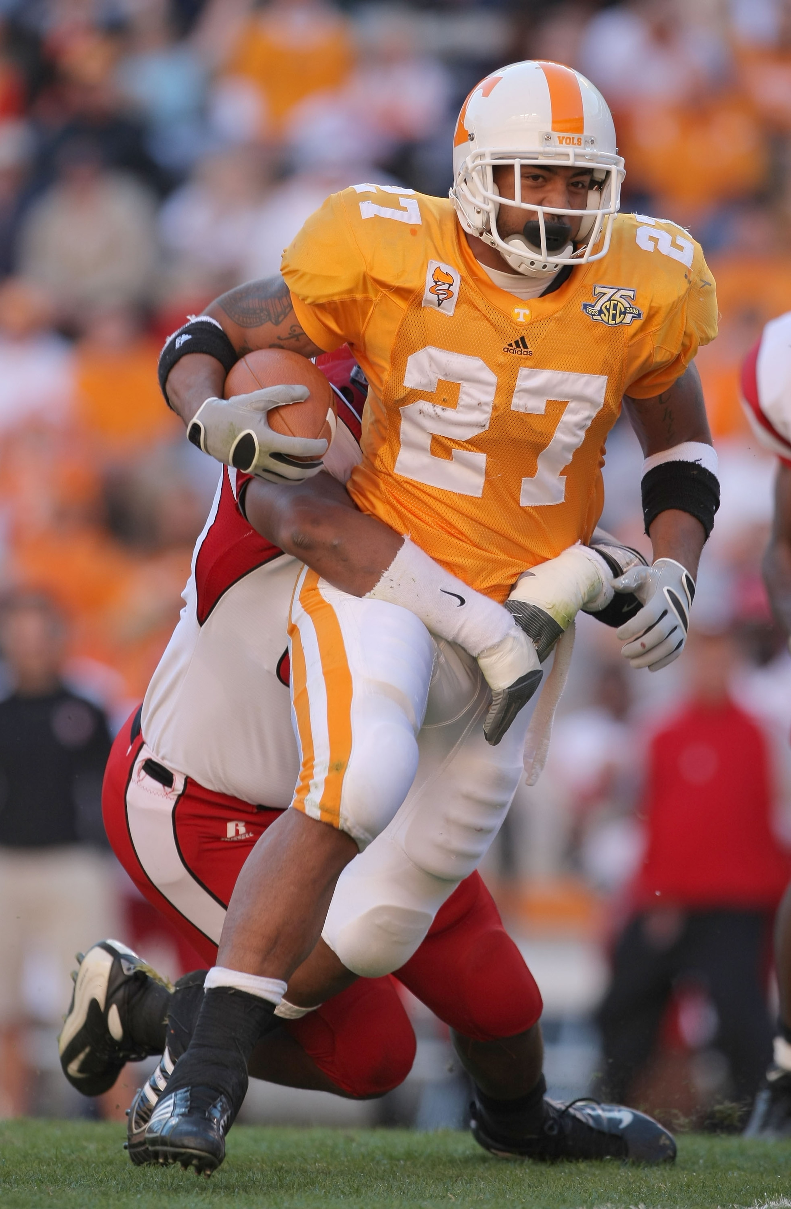 KNOXVILLE, TN - NOVEMBER 03:  Arian Foster #27 of the Tennessee Volunteers carries the ball against the Louisiana Lafayette Cajuns during the first quarter at Neyland Stadium on November 3, 2007 in Knoxville, Tennessee.  (Photo by Harry How/Getty Images)