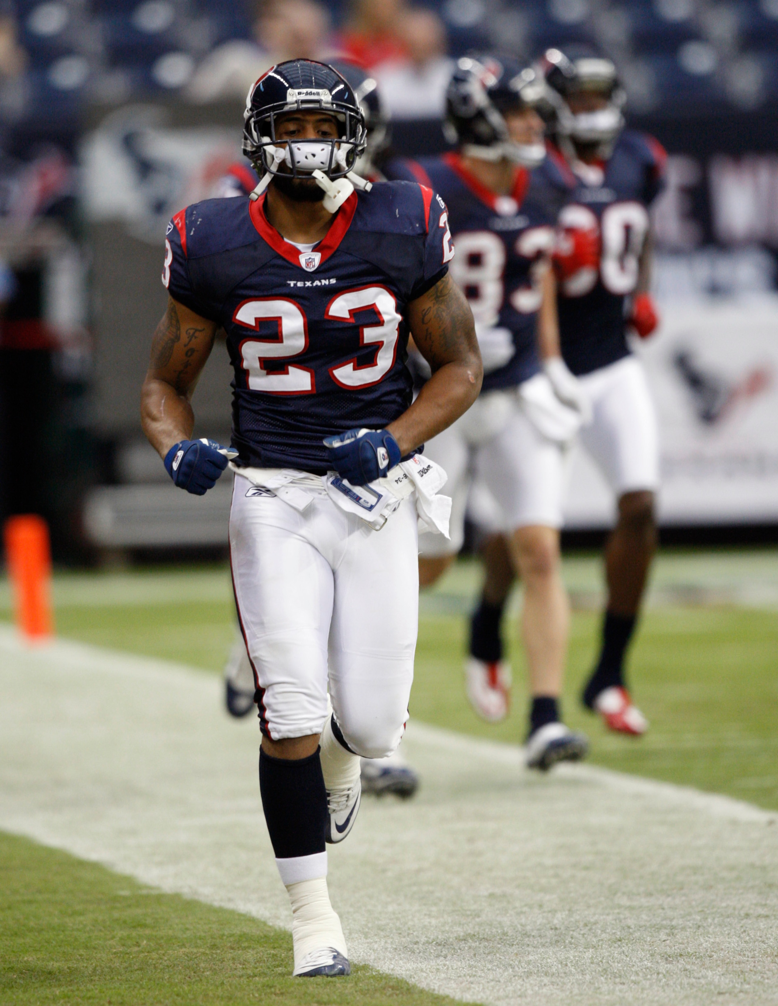 HOUSTON - SEPTEMBER 02:  Running back Arian Foster #23 of the Houston Texans takes the field during pre-game warm ups before a preseason game agains the Tampa Bay Buccaneers at Reliant Stadium on September 2, 2010 in Houston, Texas.  (Photo by Bob Levey/G