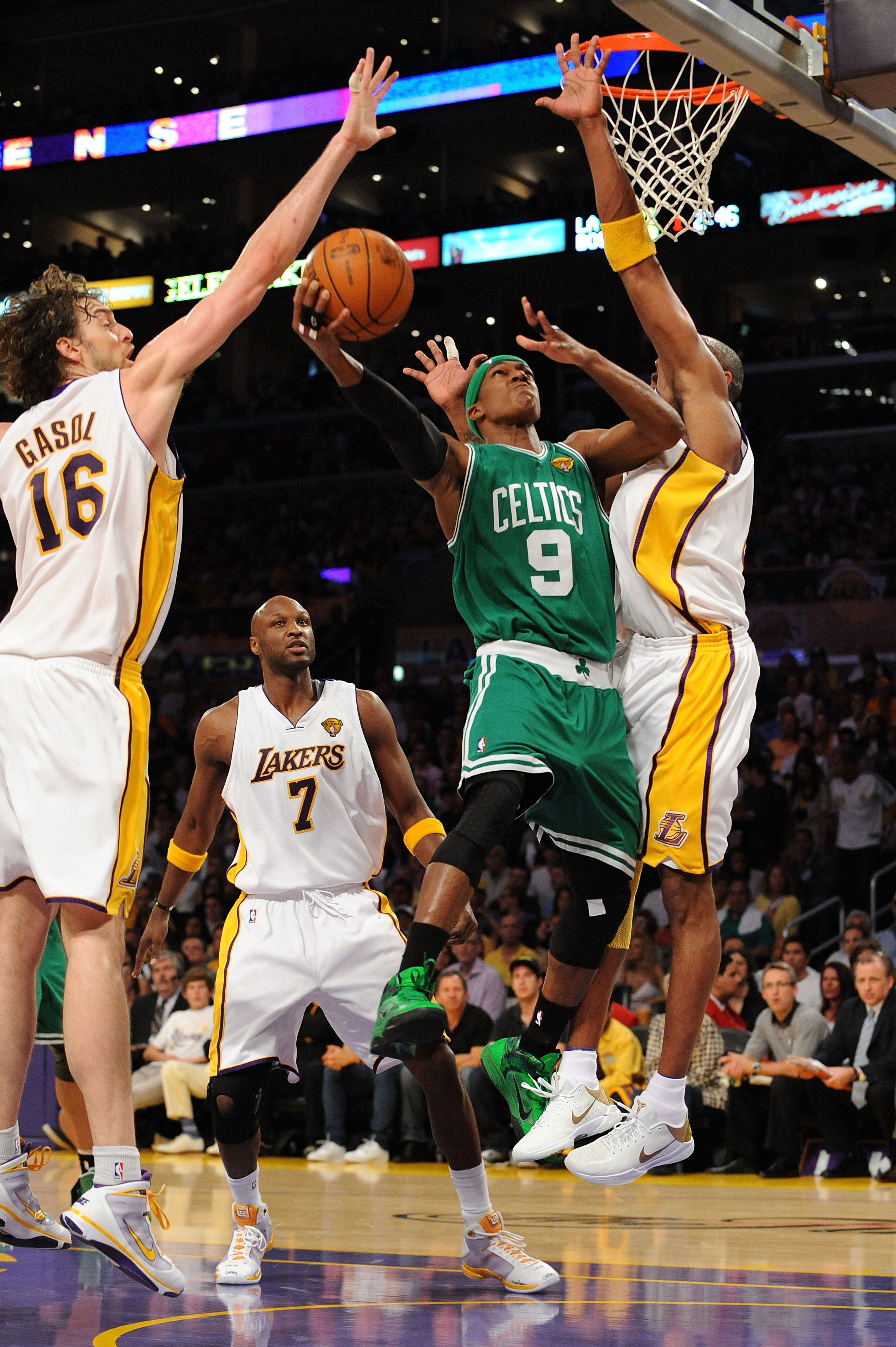 LOS ANGELES, CA - JUNE 06:  Rajon Rondo #9 of the Boston Celtics drives for a shot attempt against Pau Gasol #16, Lamar Odom #7 and Kobe Bryant #24 of the Los Angeles Lakers in Game Two of the 2010 NBA Finals at Staples Center on June 6, 2010 in Los Angel