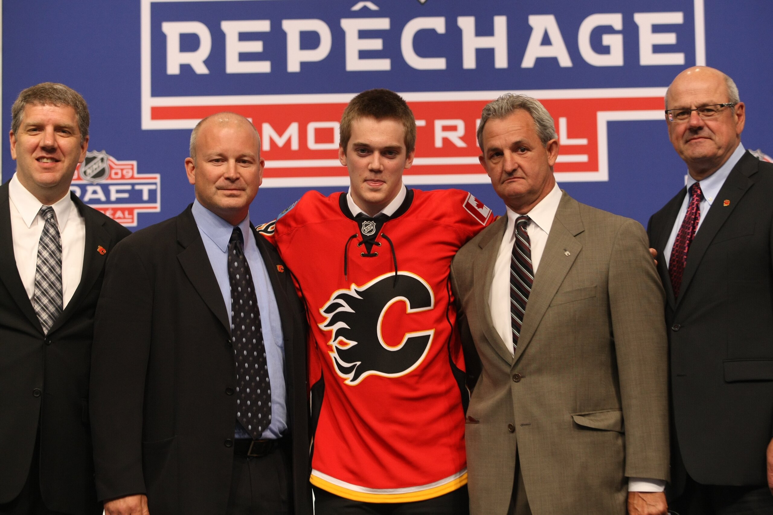 MONTREAL - JUNE 26: Calgary Flames Director of Scouting Tod Button, Scout Al Tuer, draft pick Tim Erixon, General Manager Darryl Sutter and President & CEO Ken King pose during the first round of the 2009 NHL Entry Draft at the Bell Centre on June 26, 20 MONTREAL - JUNE 26: Calgary Flames Director of Scouting Tod Button, Scout Al Tuer, draft pick Tim Erixon, General Manager Darryl Sutter and President & CEO Ken King pose during the first round of the 2009 NHL Entry Draft at the Bell Centre on June 26, 20