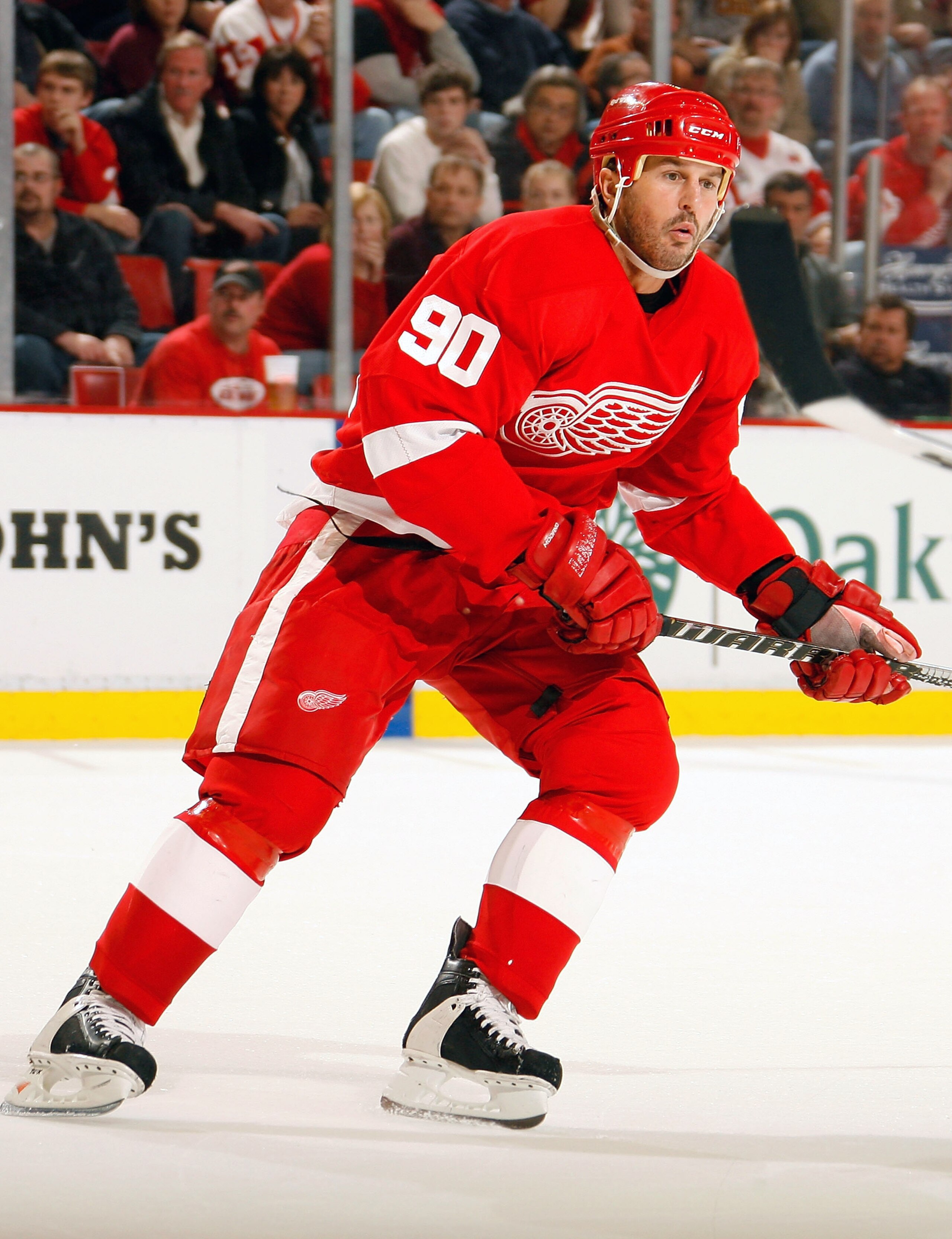 DETROIT, MI - NOVEMBER 21: Mike Modano #90 of the Detroit Red Wings skates against the Calgary Flames during their NHL game at Joe Louis Arena on November 21, 2010 in Detroit, Michigan.(Photo by Dave Sandford/Getty Images) DETROIT, MI - NOVEMBER 21: Mike Modano #90 of the Detroit Red Wings skates against the Calgary Flames during their NHL game at Joe Louis Arena on November 21, 2010 in Detroit, Michigan.(Photo by Dave Sandford/Getty Images)