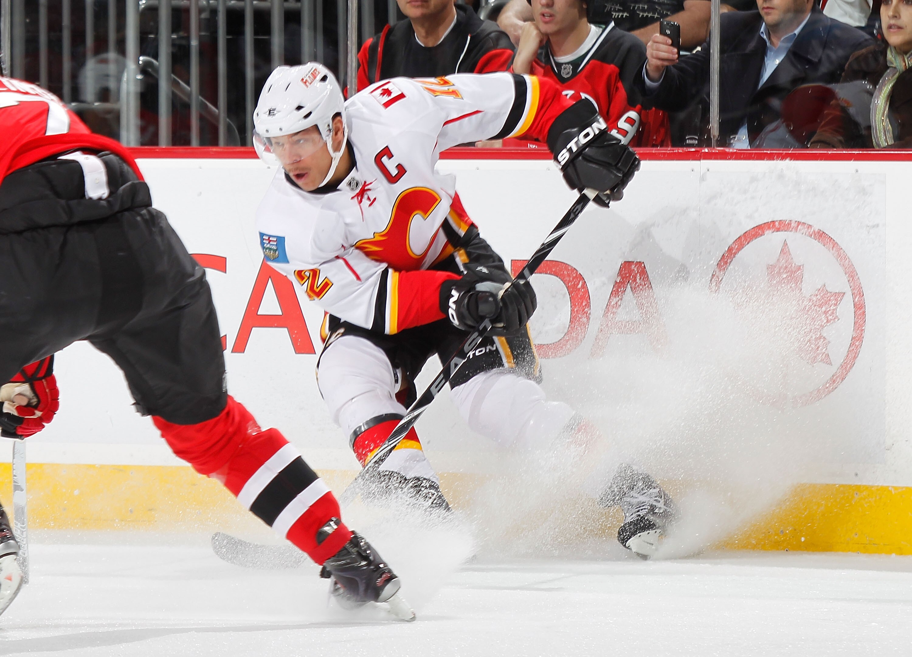 NEWARK, NJ - NOVEMBER 24:  Jarome Iginla #12 of the Calgary Flames skates during a hockey game against the New Jersey Devils at the Prudential Center on November 24, 2010 in Newark, New Jersey.  (Photo by Paul Bereswill/Getty Images)