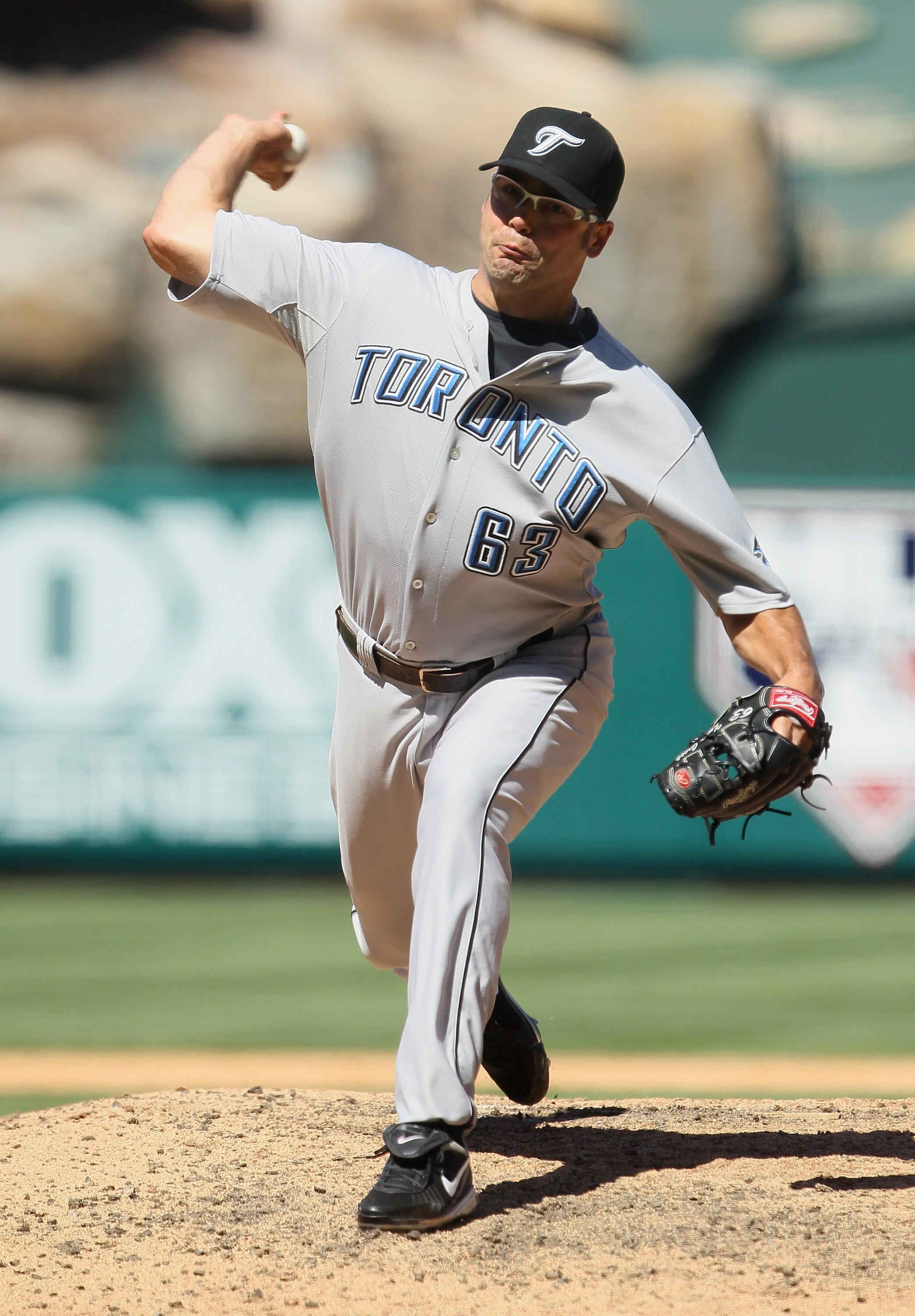 ANAHEIM, CA - AUGUST 15:  Kevin Gregg #63 of the Toronto Blue Jays pitches against the Los Angeles Angels of Anaheim in the ninth inning at Angel Stadium on August 15, 2010 in Anaheim, California. The Blue Jays defeated the Angels 4-1.  (Photo by Jeff Gro