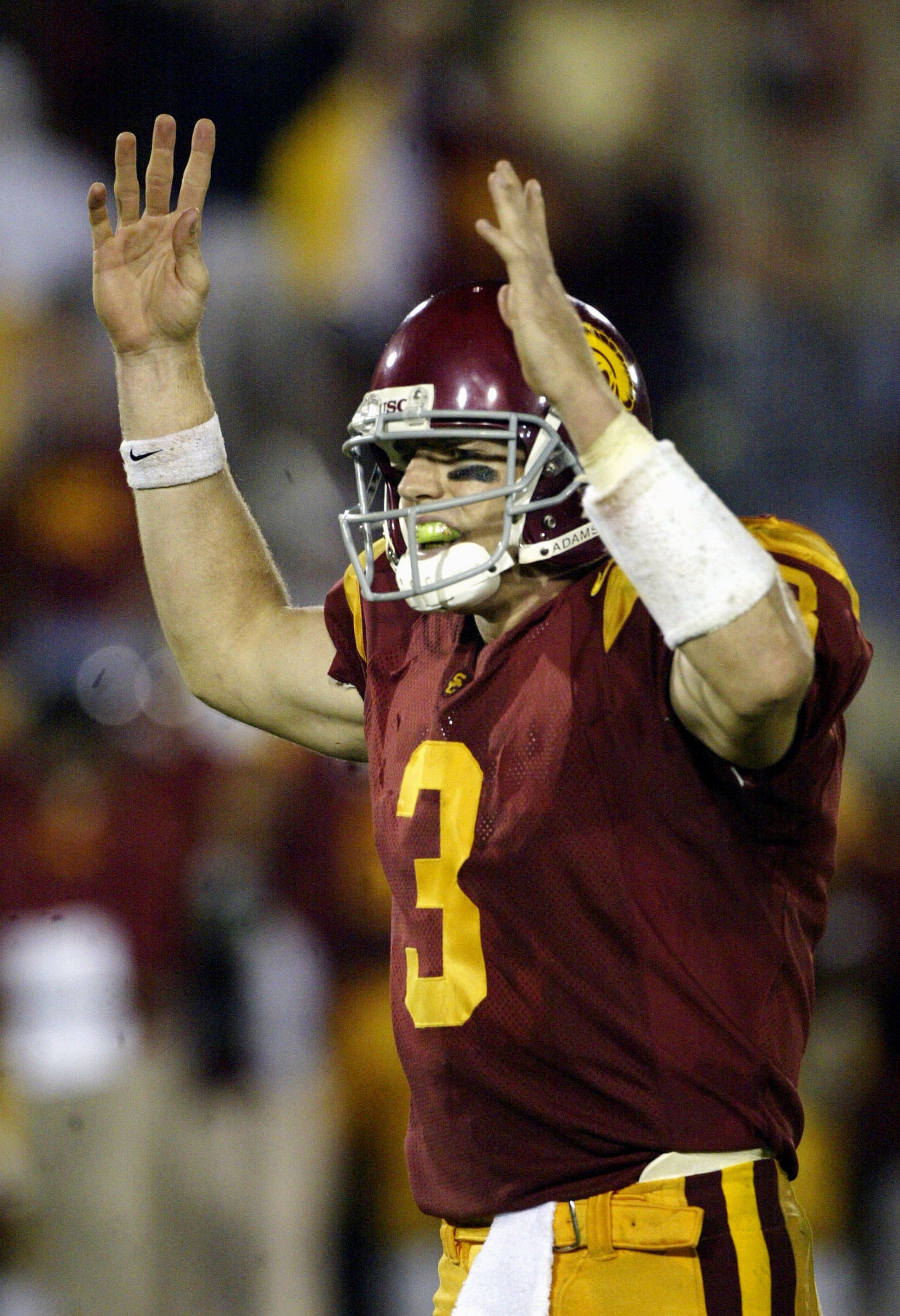 LOS ANGELES - NOVEMBER 30: Carson Palmer, quarterback of the University of Southern California Trojans celebrates a touchdown in the second half against the Notre Dame Fighting Irish at the Los Angeles Coliseum on November 30, 2002 in Los Angeles, Califor