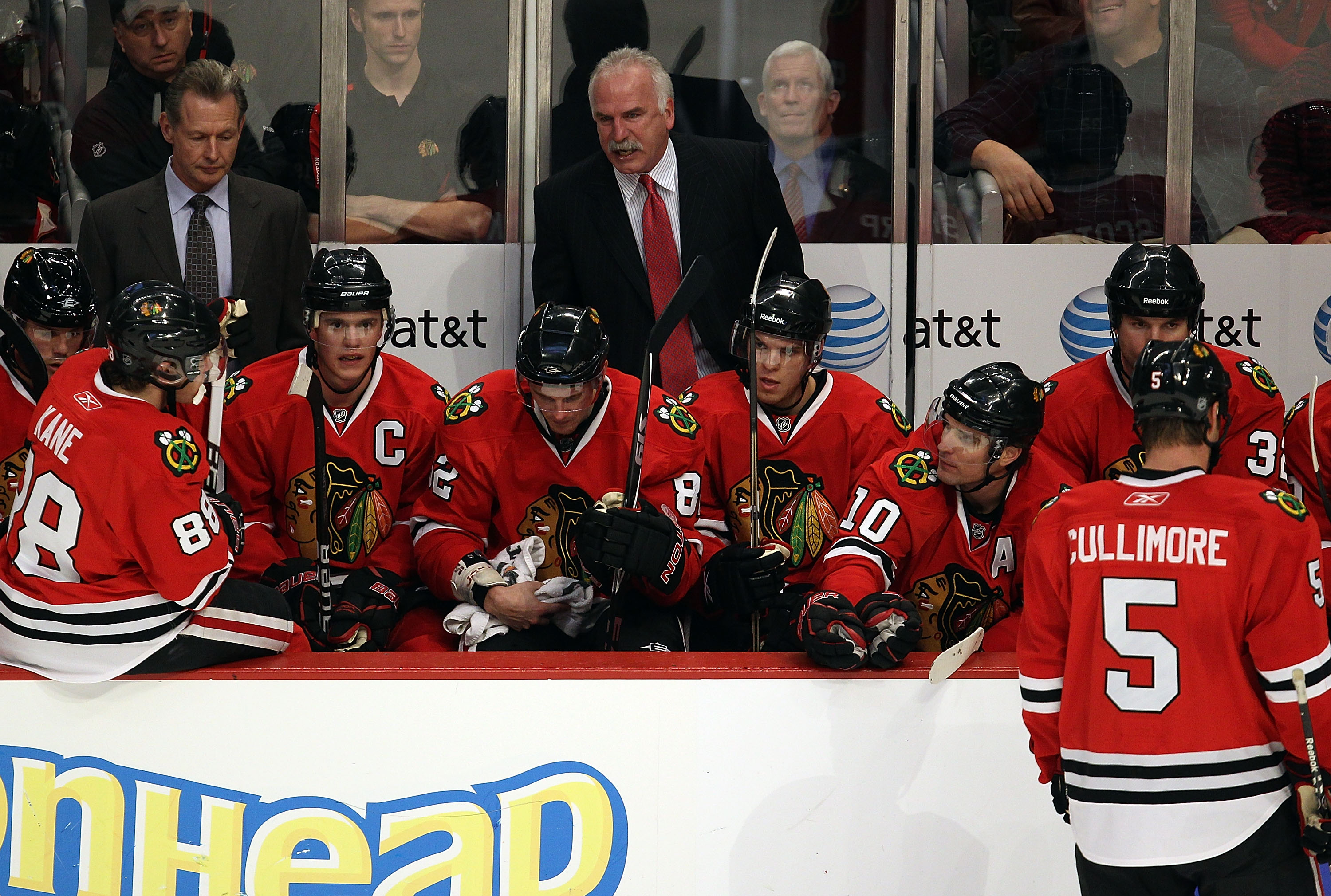 CHICAGO - NOVEMBER 30: Head coach Joel Quenneville of the Chicago Blackhawks (center) yells at his team during a time-out in the 3rd period of a game against the St. Louis Blues at the United Center on November 30, 2010 in Chicago, Illinois. The Blackhawk