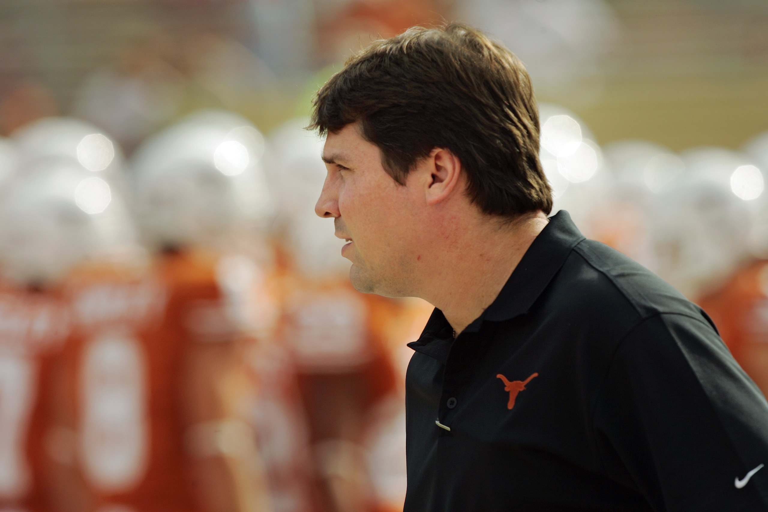 AUSTIN, TX - NOVEMBER 07:  Defensive coordinator Will Muschamp of the Texas Longhorns watches the defense prepare against the UCF Knights on November 7, 2009 at Darrell K Royal - Texas Memorial Stadium in Austin, Texas.  Texas won 35-3.  (Photo by Brian B