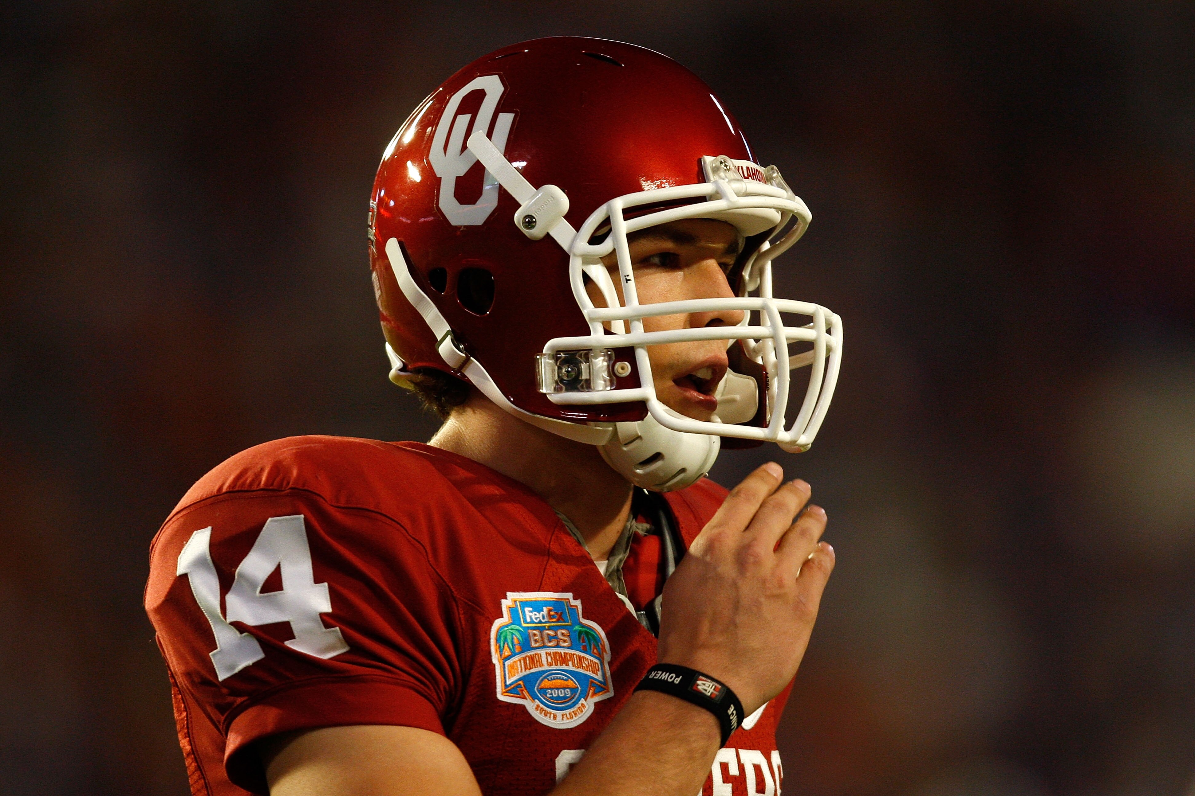 MIAMI - JANUARY 08:  Quarterback Sam Bradford #14 of the Oklahoma Sooners looks on against the Florida Gators during the FedEx BCS National Championship game at Dolphin Stadium on January 8, 2009 in Miami, Florida.  (Photo by Marc Serota/Getty Images)