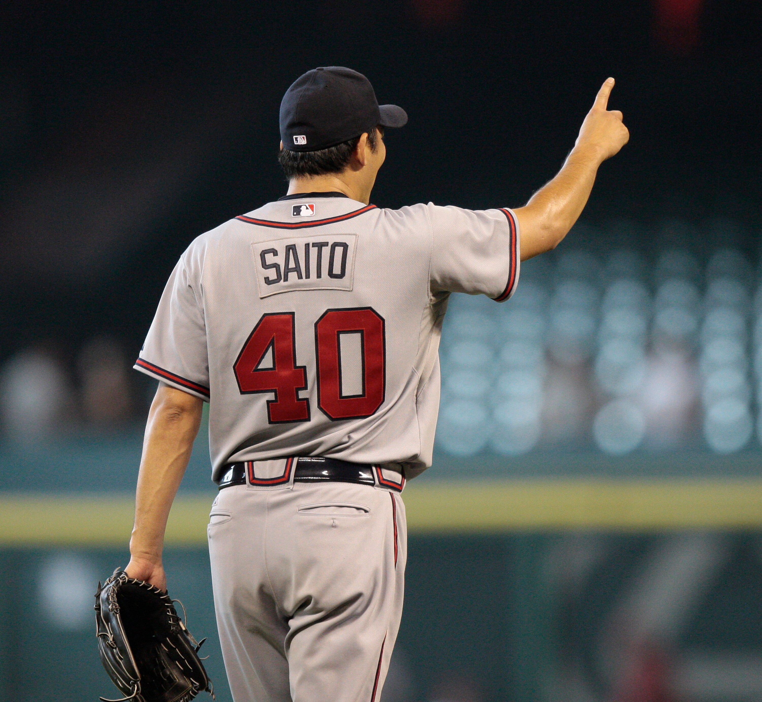 HOUSTON - AUGUST 11:  Pitcher Takashi Saito #40 of Japan pitches in the tenth inning against the Houston Astros at Minute Maid Park on August 11, 2010 in Houston, Texas.  (Photo by Bob Levey/Getty Images)