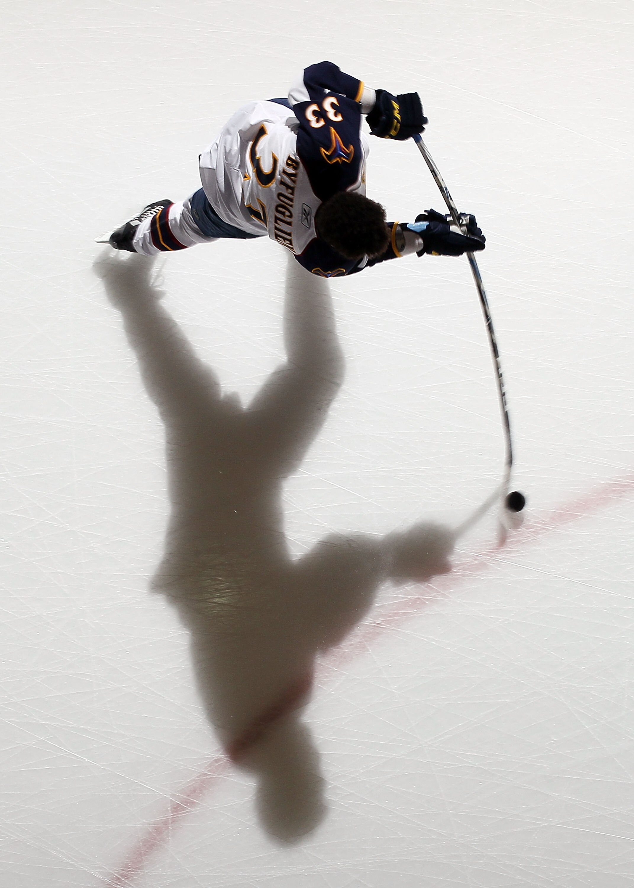 UNIONDALE, NY - DECEMBER 11:  Dustin Byfuglien #33 of the Atlanta Thrashers warms up before playing against the New York Islanders on December 11, 2010 at Nassau Coliseum in Uniondale, New York.  (Photo by Jim McIsaac/Getty Images)