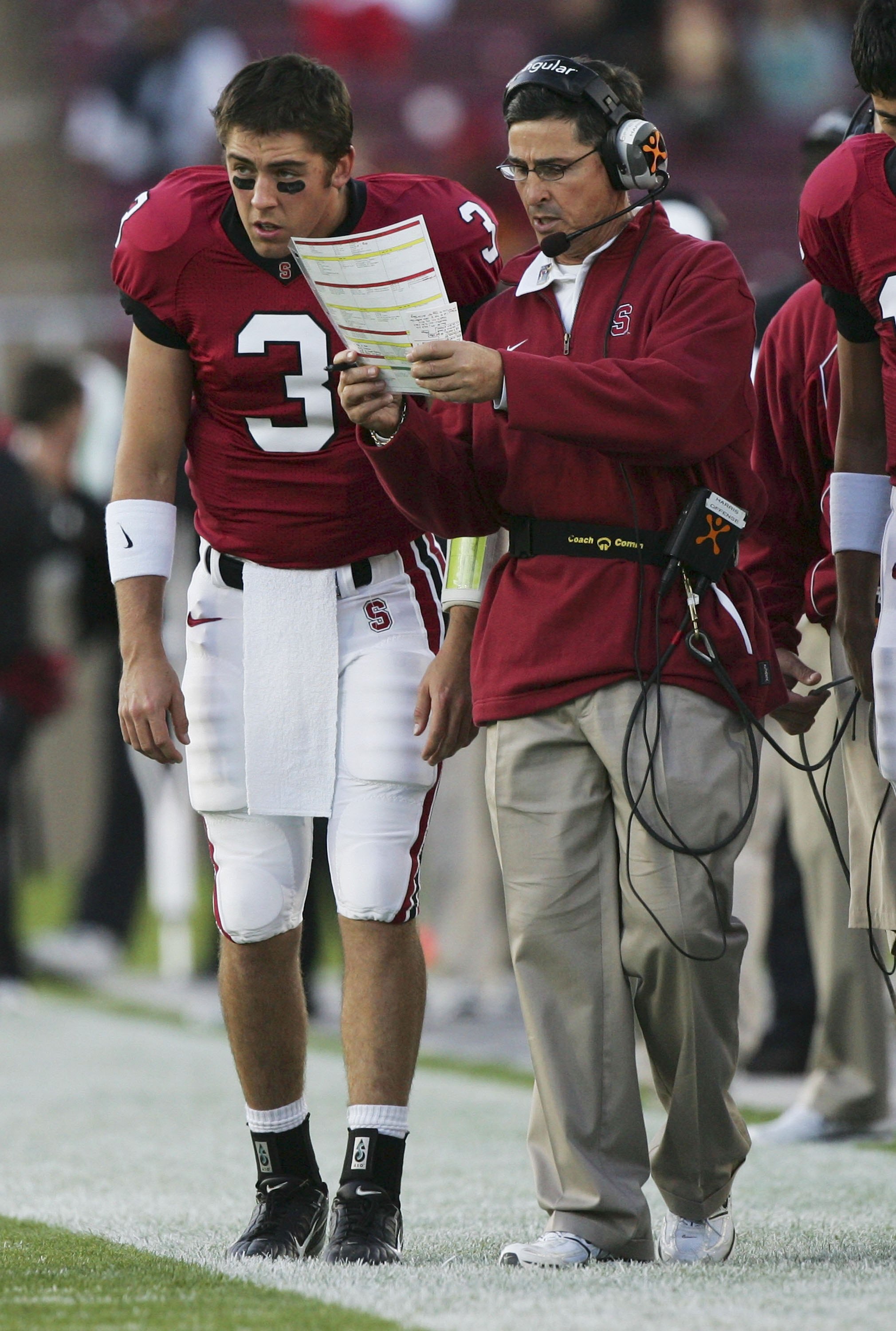 PALO ALTO, CA - NOVEMBER 4: Head coach Walt Harris of the Stanford Cardinal calls a play with Garrett Moore #3 against the USC Trojans during a game on November 4, 2006 at Stanford Stadium in Palo Alto, California.  (Photo by Jed Jacobsohn/Getty Images)