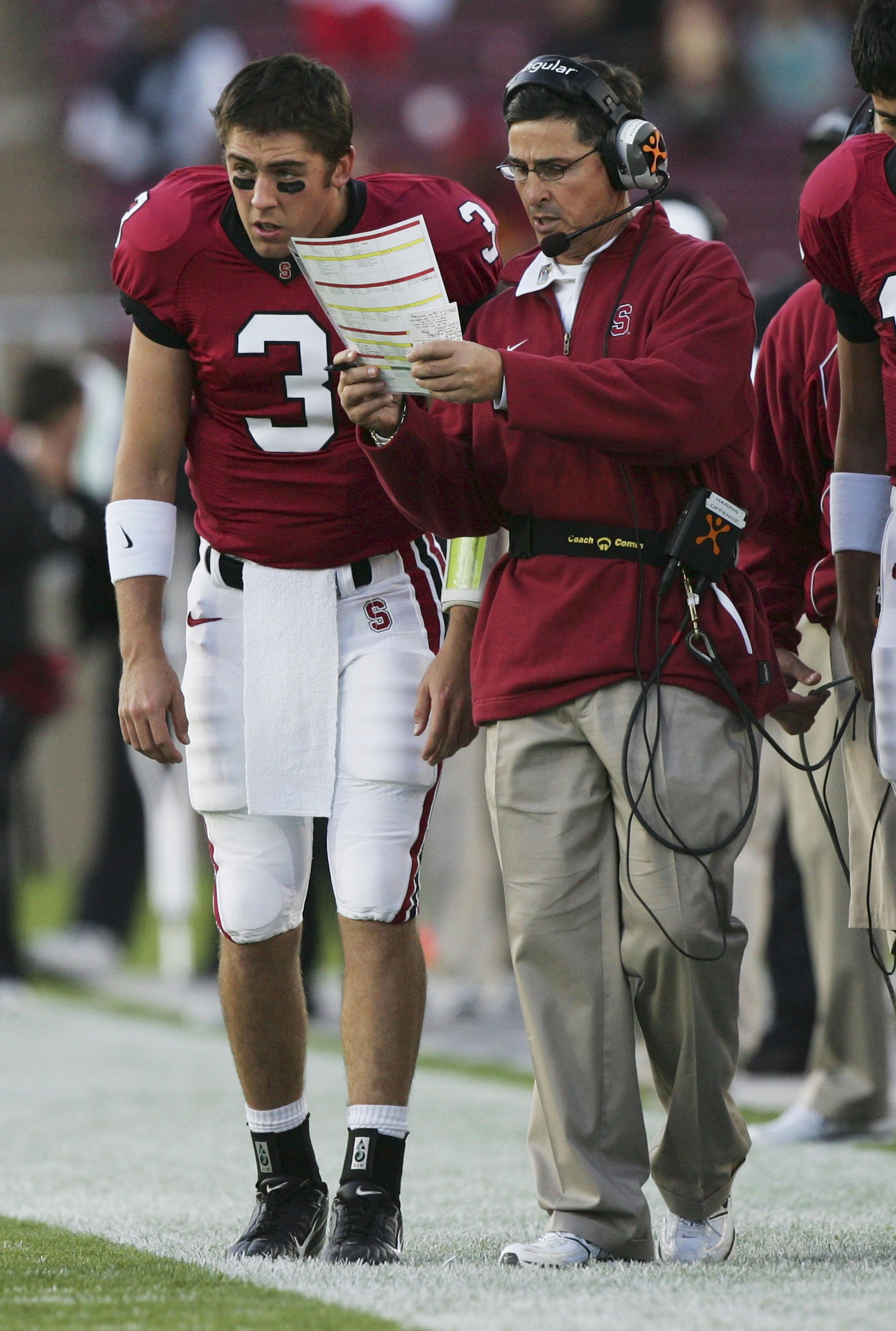 PALO ALTO, CA - NOVEMBER 4: Head coach Walt Harris of the Stanford Cardinal calls a play with Garrett Moore #3 against the USC Trojans during a game on November 4, 2006 at Stanford Stadium in Palo Alto, California.  (Photo by Jed Jacobsohn/Getty Images)