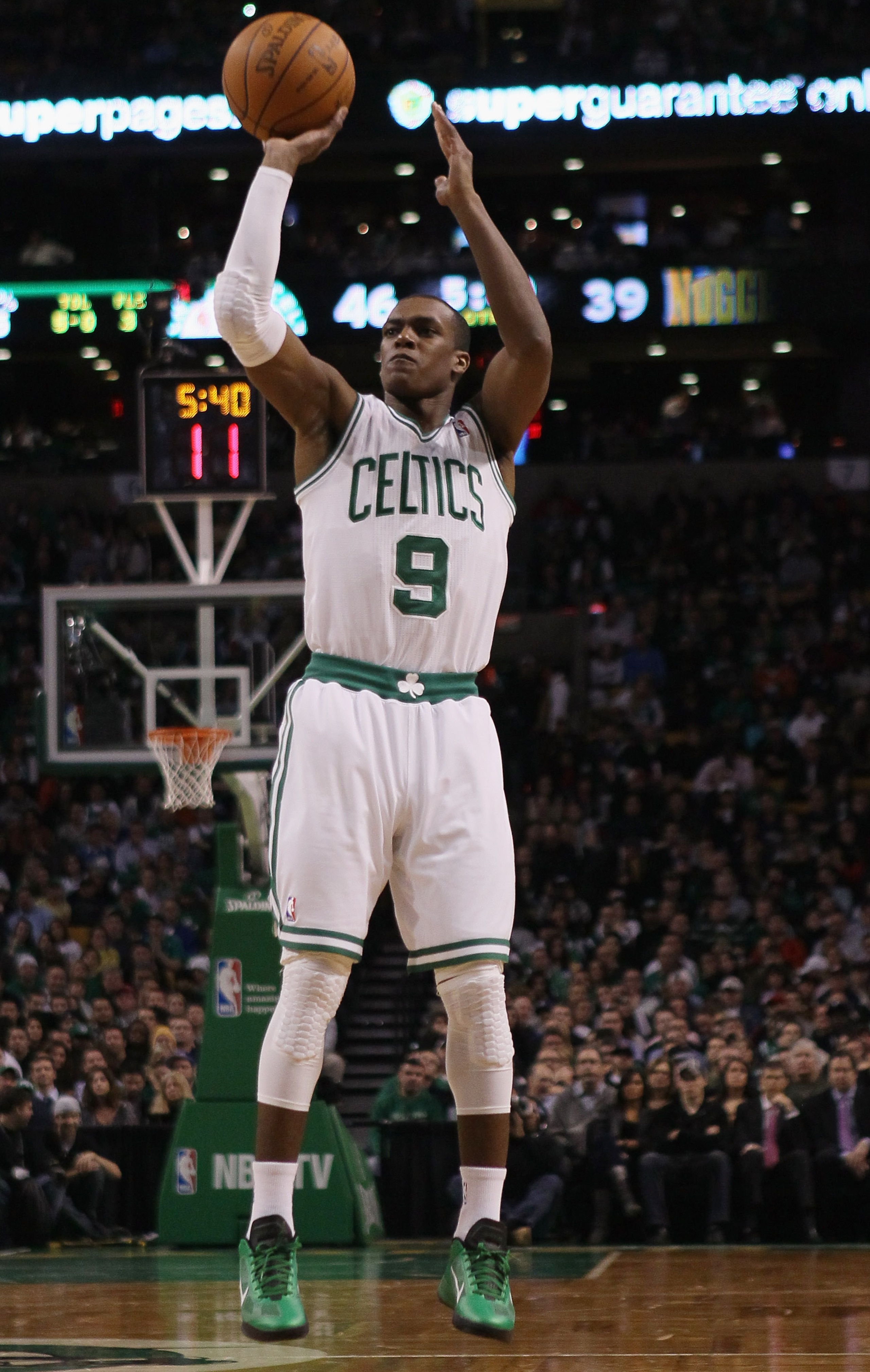 BOSTON, MA - DECEMBER 08:  Rajon Rondo #9 of the Boston Celtics takes a shot against the Denver Nuggets on December 8, 2010 at the TD Garden in Boston, Massachusetts. NOTE TO USER: User expressly acknowledges and agrees that, by downloading and/or using t