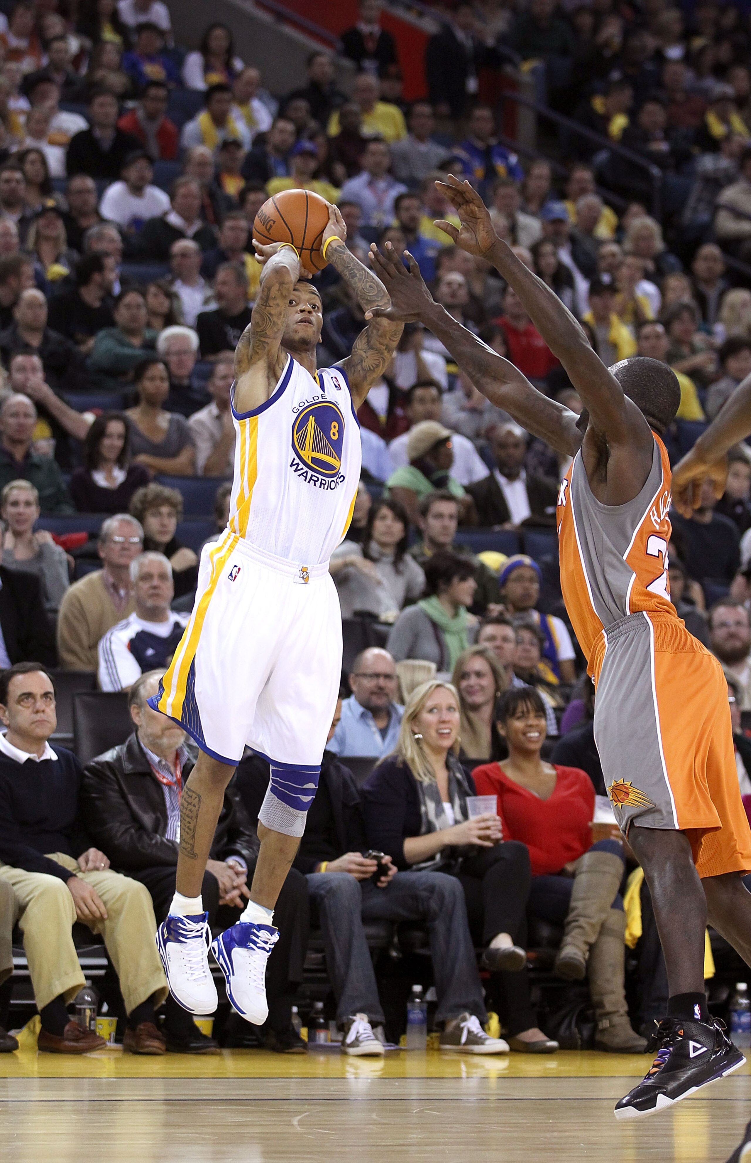OAKLAND, CA - DECEMBER 02:  Monta Ellis #8 of the Golden State Warriors in action against the Phoenix Suns at Oracle Arena on December 2, 2010 in Oakland, California. NOTE TO USER: User expressly acknowledges and agrees that, by downloading and or using t