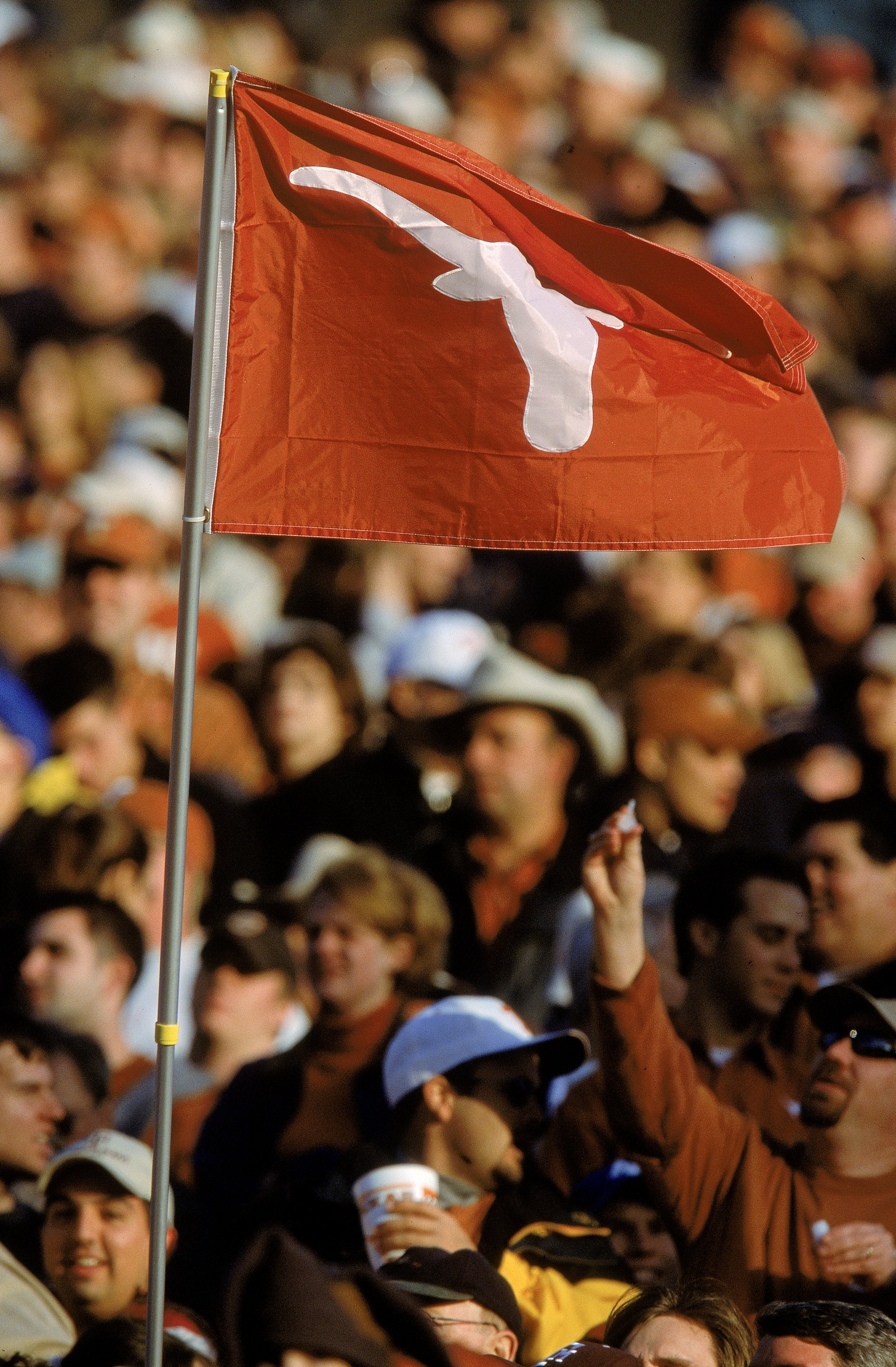 24 Nov 2000:  A view of the Texas Longhorns fans as they wave a longhorn flag during the game against the Texas A&M Aggies at the Royal Memorial Stadium in Austin, Texas. The Longhorns defeated the Aggies 43-17.Mandatory Credit: Brian Bahr  /Allsport