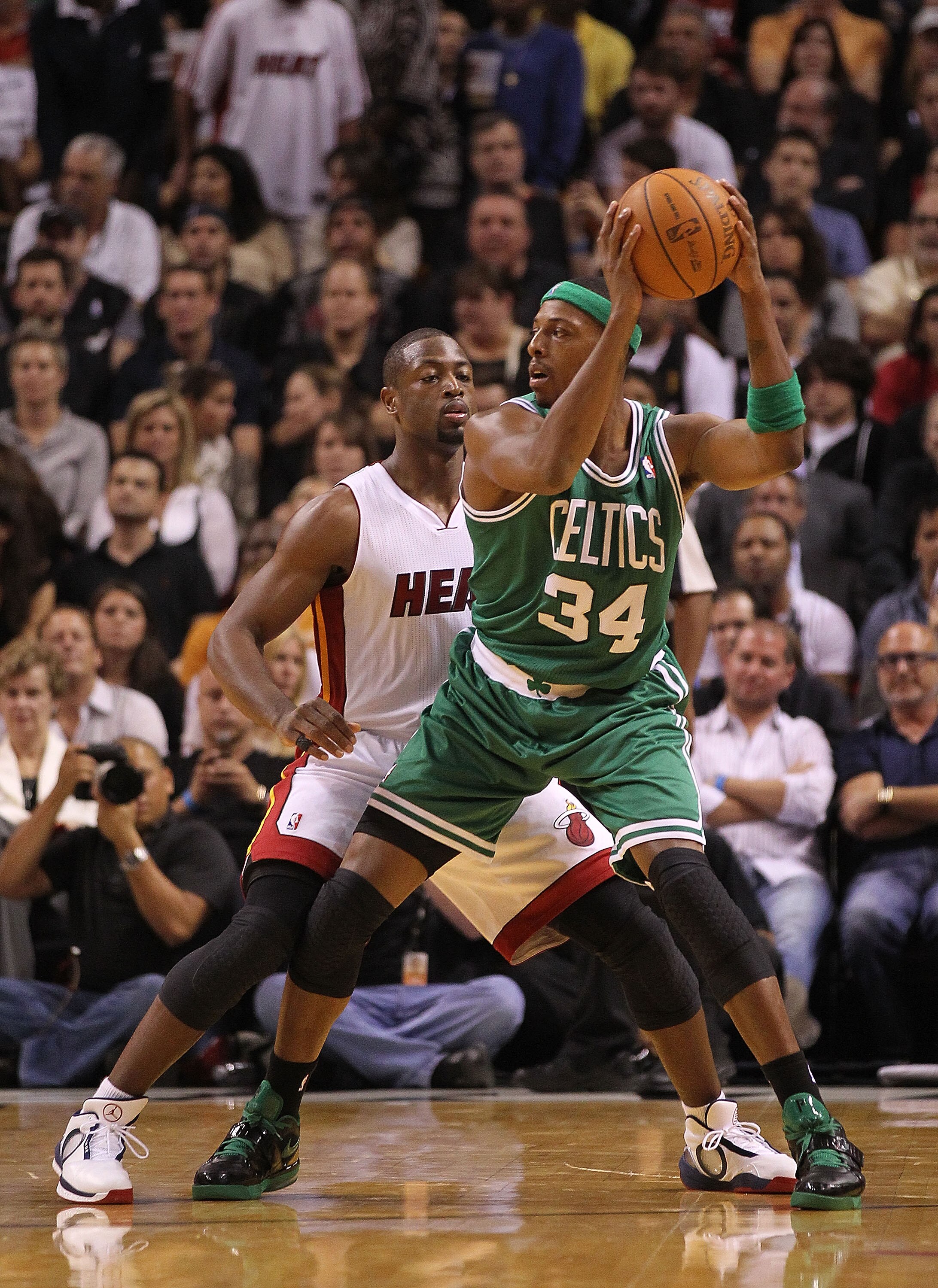 MIAMI - NOVEMBER 11:  Paul Pierce #34 of the Boston Celtics shoots over Dwyane Wade #3  during a game against the Miami Heat at American Airlines Arena on November 11, 2010 in Miami, Florida. NOTE TO USER: User expressly acknowledges and agrees that, by d