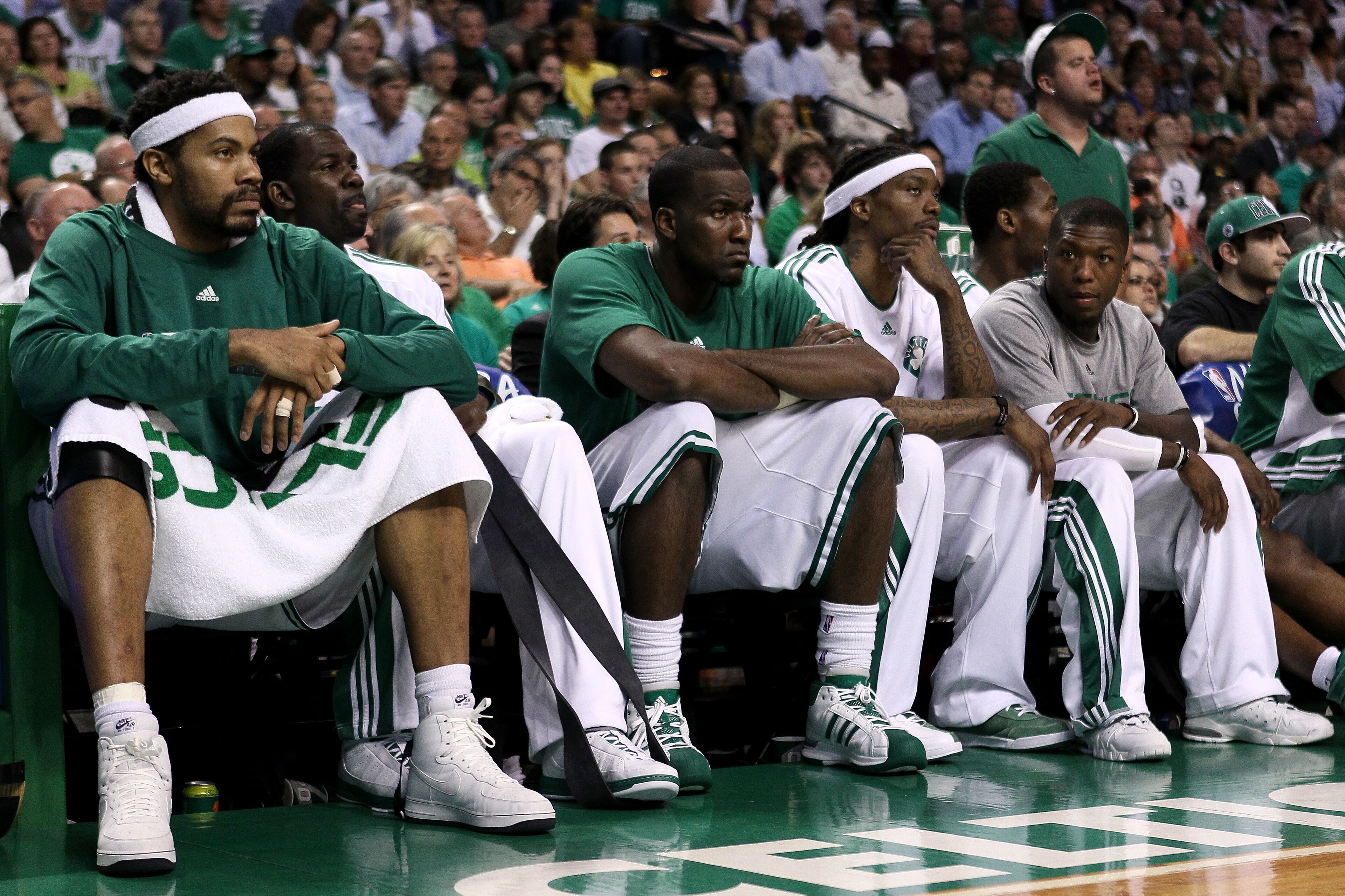 BOSTON - MAY 24:  (L-R) Rasheed Wallace #30, Michael Finley #40, Kendrick Perkins #43, Marquis Daniels and Nate Robinson #4 of the Boston Celtics look on from the bench late in the fourth quarter against the Orlando Magic in Game Four of the Eastern Confe