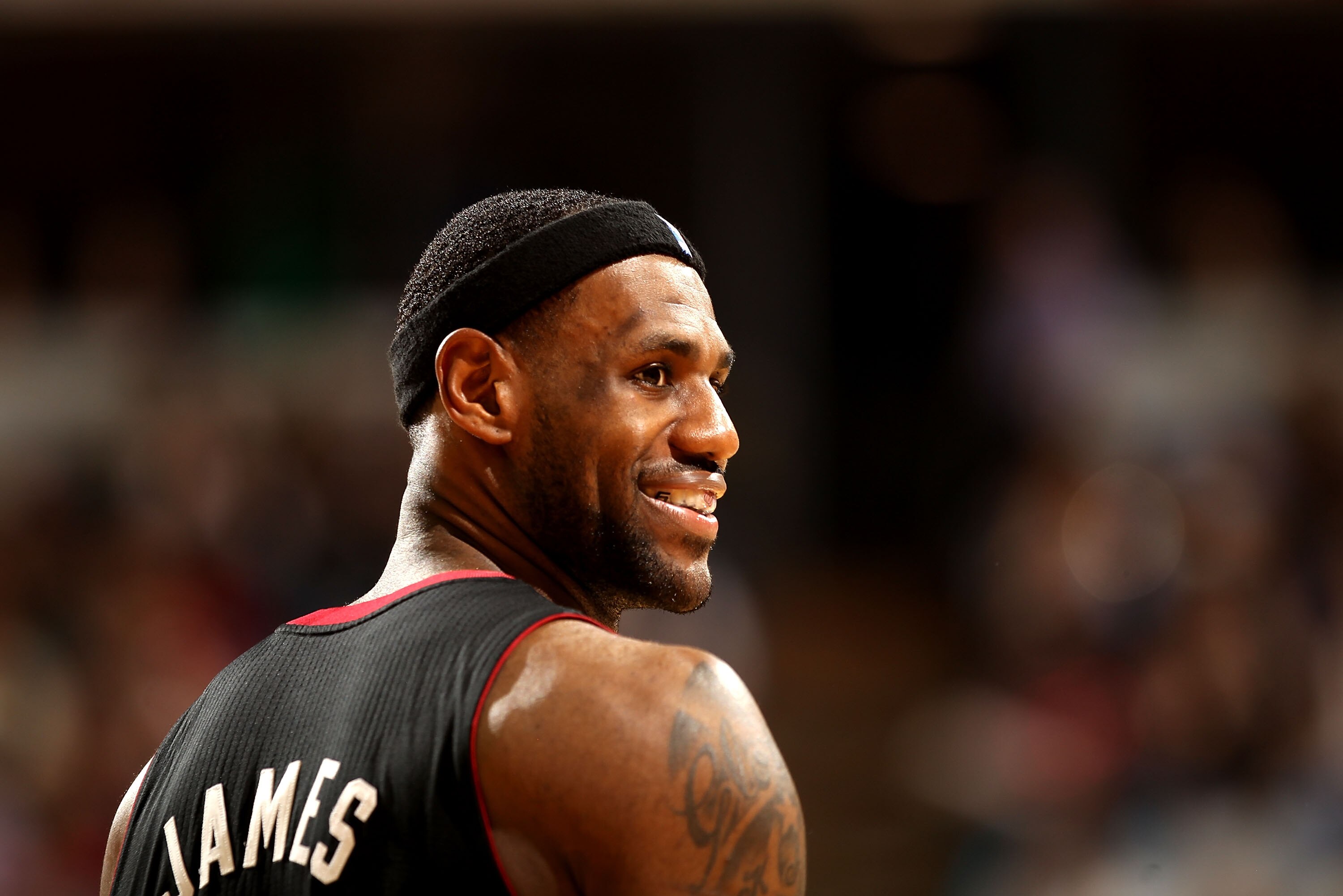SACRAMENTO, CA - DECEMBER 11:  Lebron James #6 of the Miami Heat smiles during their game against the Sacramento Kings at ARCO Arena on December 11, 2010 in Sacramento, California.  NOTE TO USER: User expressly acknowledges and agrees that, by downloading