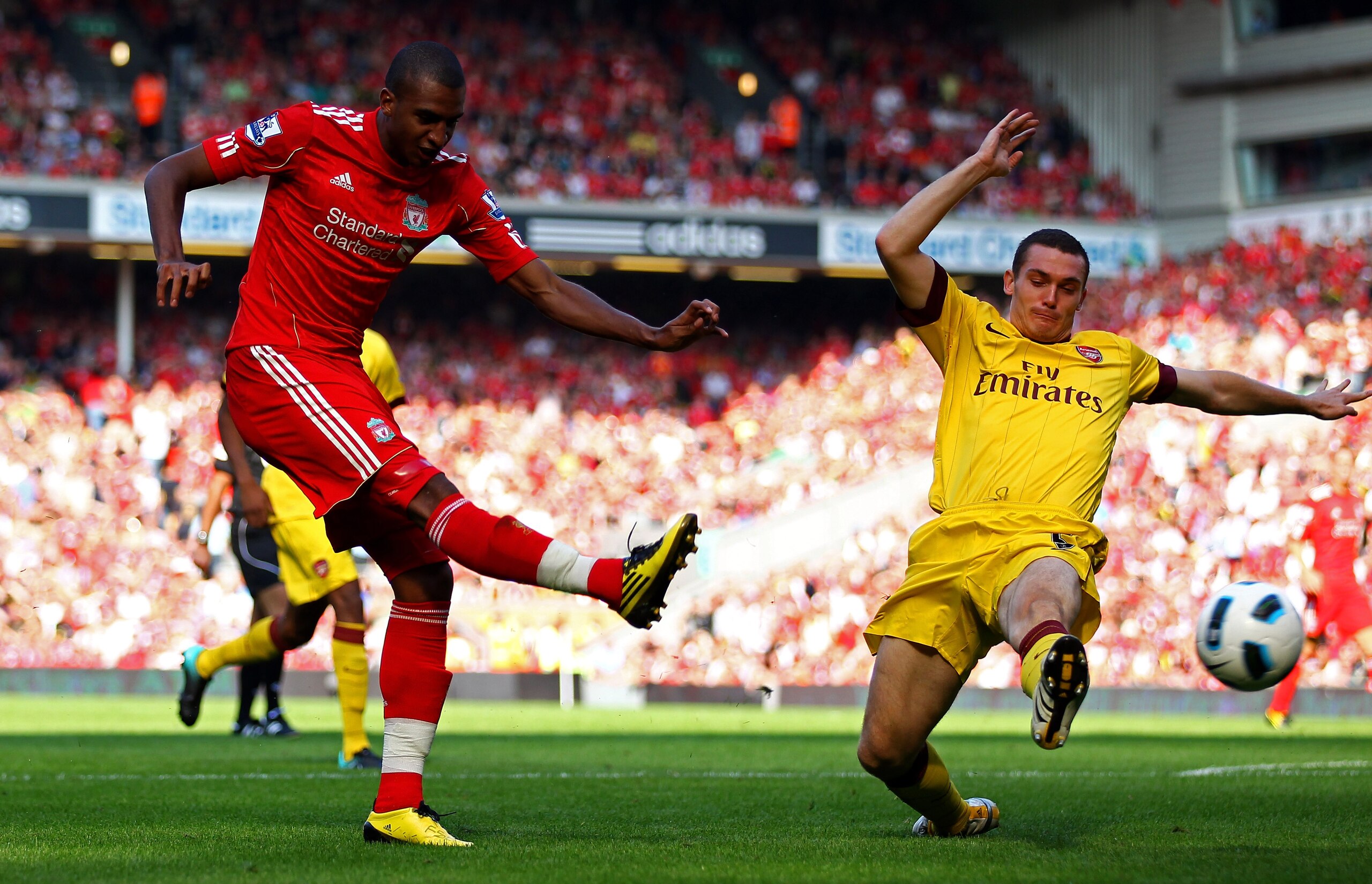 LIVERPOOL, ENGLAND - AUGUST 15:  David Ngog of Liverpool scores the opening goal during the Barclays Premier League match between Liverpool and Arsenal at Anfield on August 15, 2010 in Liverpool, England. (Photo by Clive Brunskill/Getty Images)