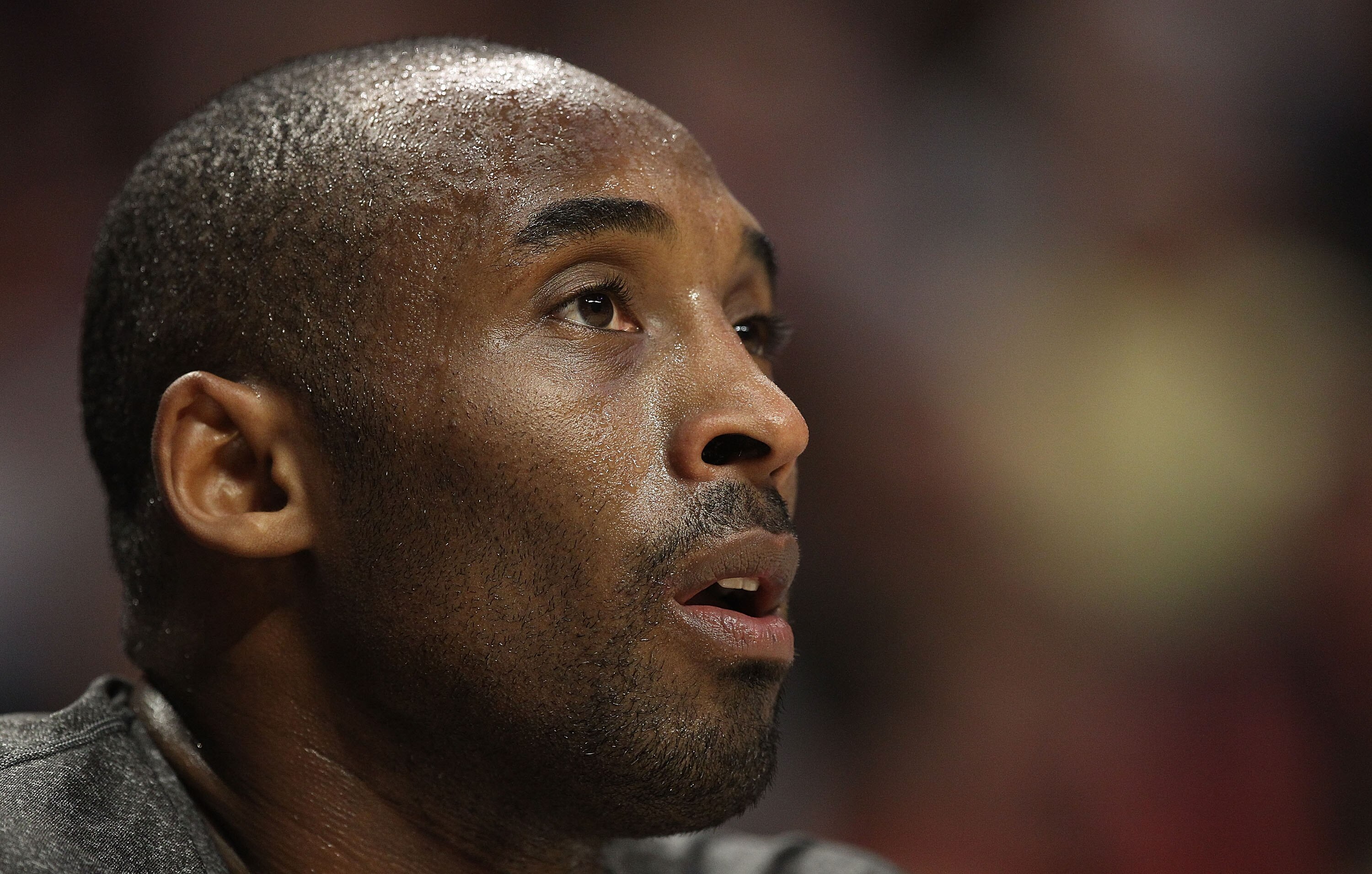 CHICAGO, IL - DECEMBER 10: Kobe Bryant #24 of the Los Angeles Lakers watches from the bench as his teammates take on the Chicago Bulls at the United Center on December 10, 2010 in Chicago, Illinois. The Bulls defeated the Lakers 88-84. NOTE TO USER: User