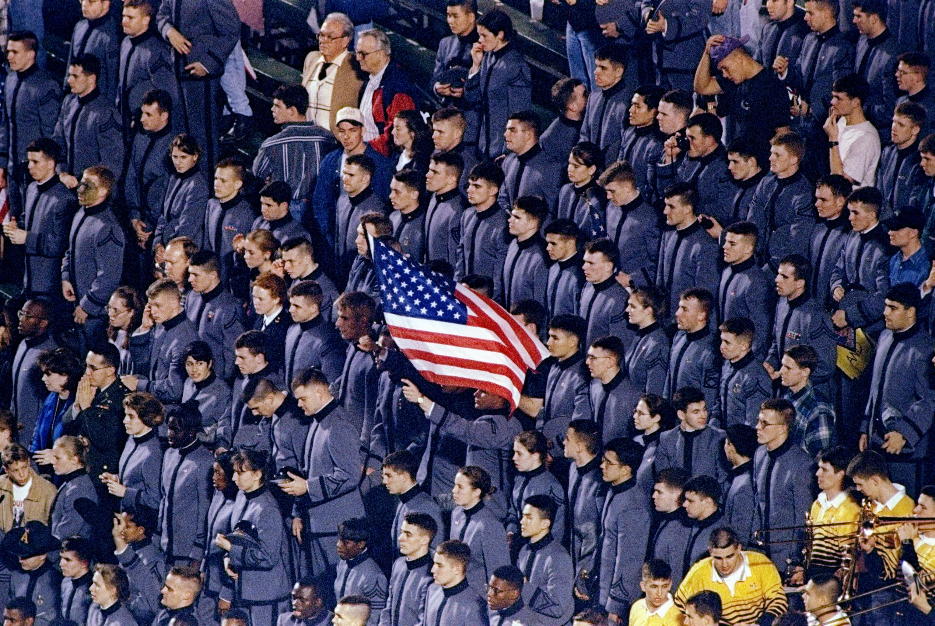 31 Dec 1996:  Army cadets look on and wave Old Glory during the Independence Bowl between the Army Cadets and the Auburn Tigers in Shreveport, Louisiana.  Auburn won the game, 32-29. Mandatory Credit: Brian Bahr  /Allsport