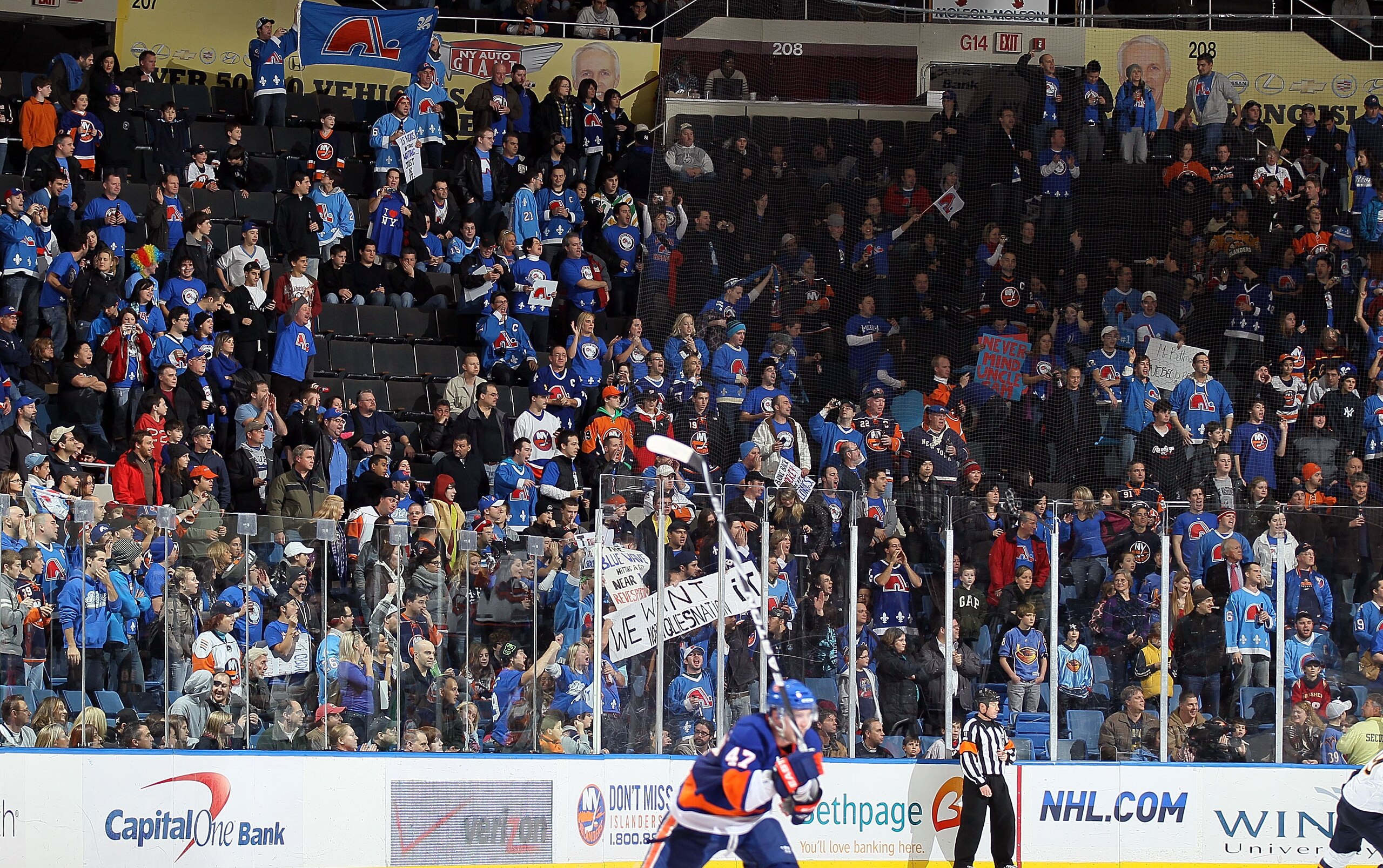 UNIONDALE, NY - DECEMBER 11:  Members of 'Nordiques Nation' watch the NHL game between the New York Islanders and the Atlanta Thrashers on December 11, 2010 at Nassau Coliseum in Uniondale, New York.  Over 1,100 fans from Quebec attended the game to show