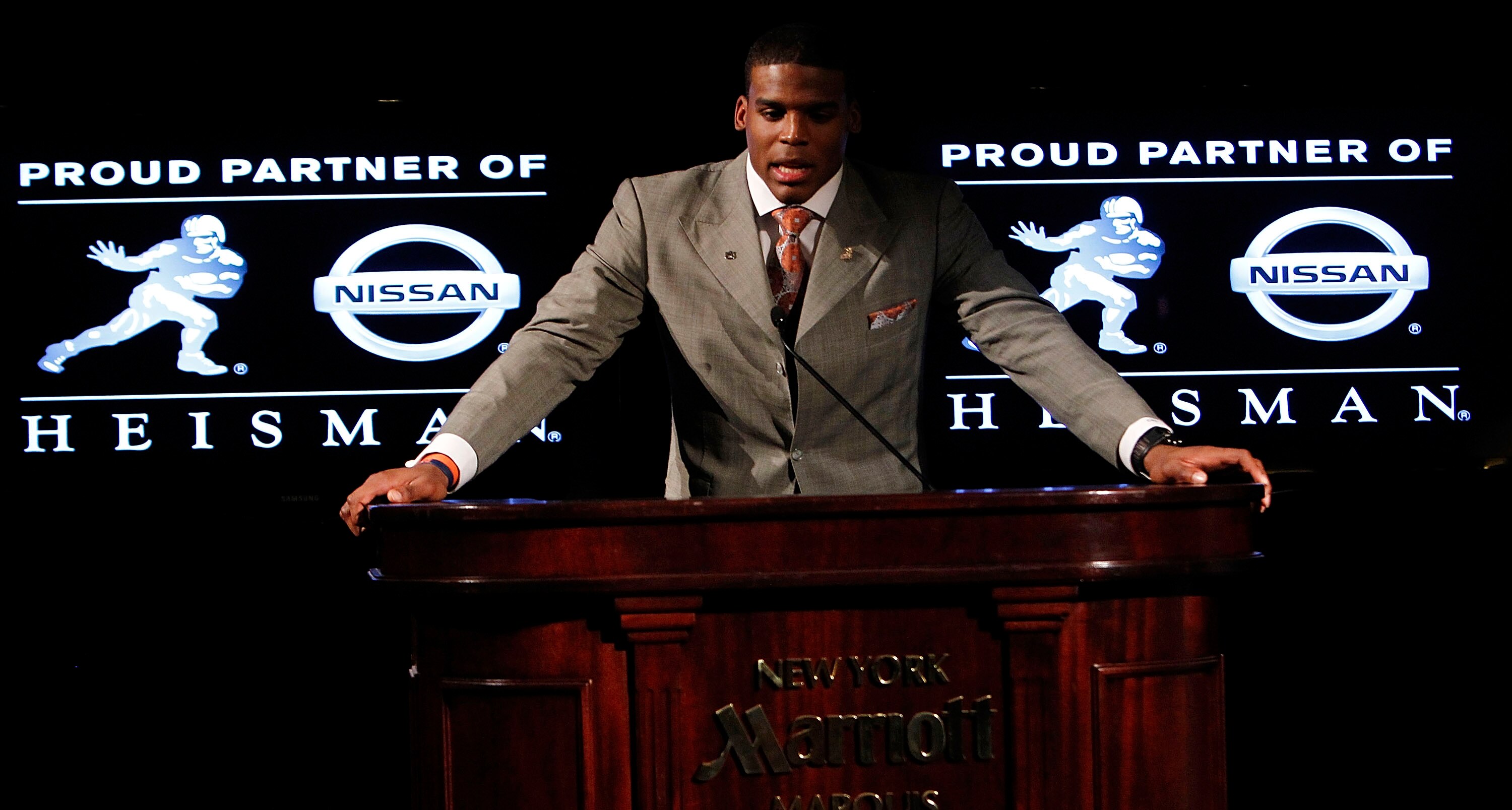 NEW YORK - DECEMBER 11:  Cam Newton, quarterback of the Auburn University Tigers, speaks after being awarded the 2010 Heisman Memorial Trophy Award on December 11, 2010 in New York City.  (Photo by Jeff Zelevansky/Getty Images)